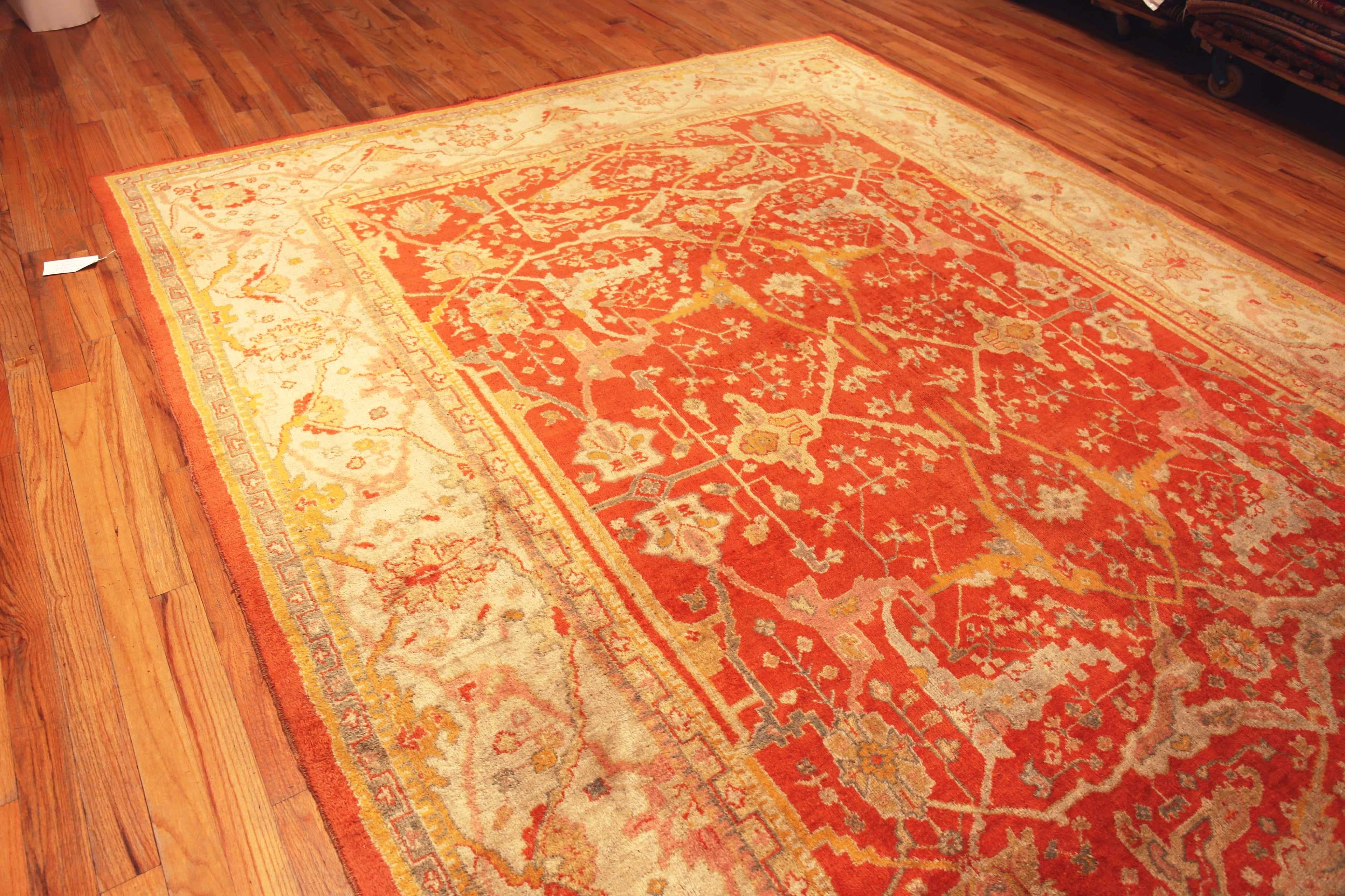Decorative Antique Turkish Oushak Rug, Country of Origin: Turkey, Circa date: 1920. Size: 10 ft x 13 ft 3 in (3.05 m x 4.04 m)