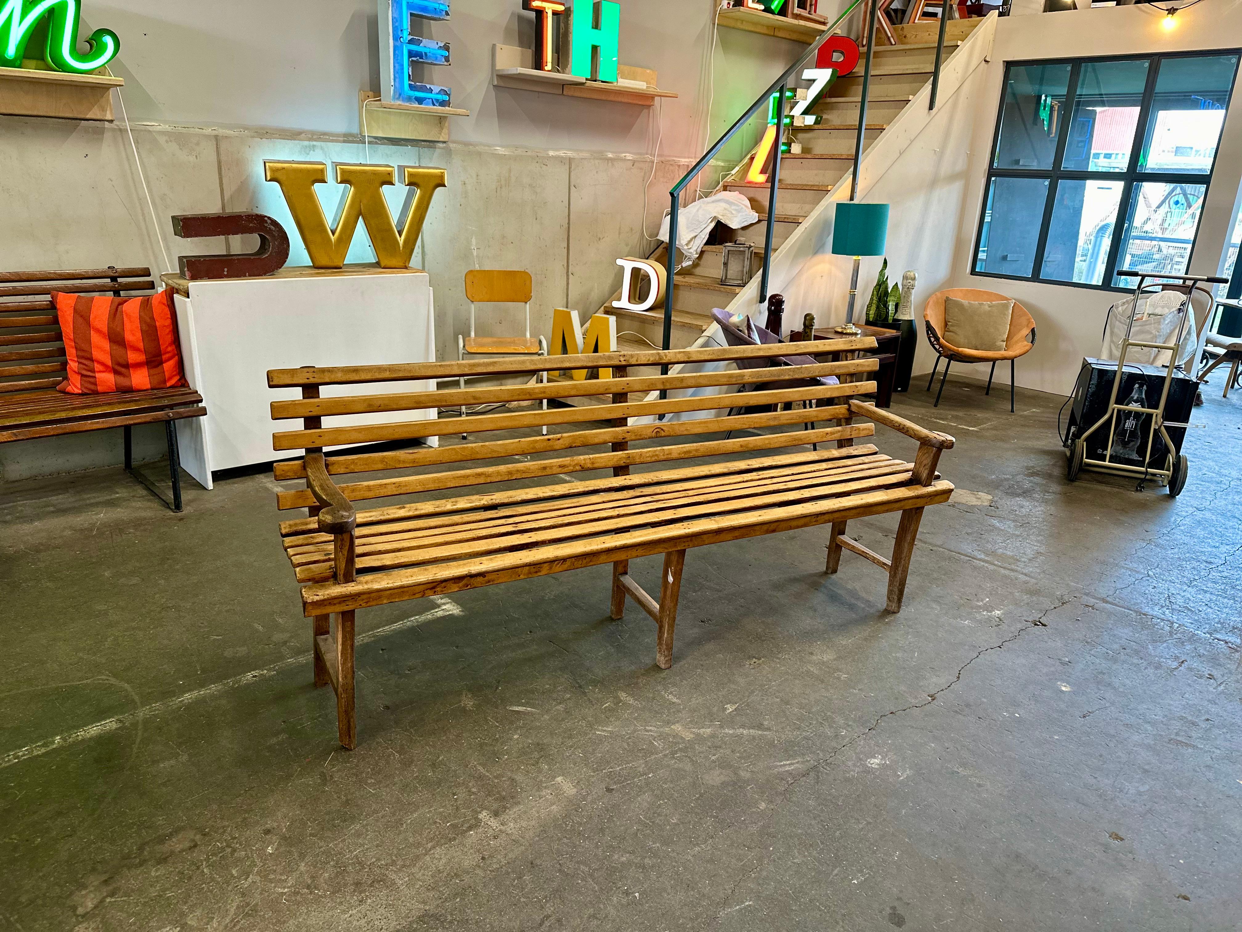 decorative antique wooden bench
Step into the past with our handcrafted light-toned wooden bench, a piece of timeless elegance from around 1900. Constructed from softwood, this bench features graceful armrests and showcases a beautiful patina that