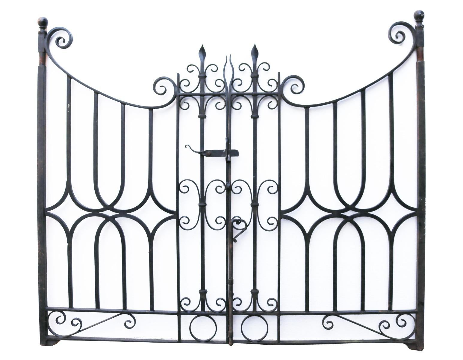 A set of reclaimed blacksmith made wrought iron garden gates with posts.

For an opening of approximately 192 cm.

   