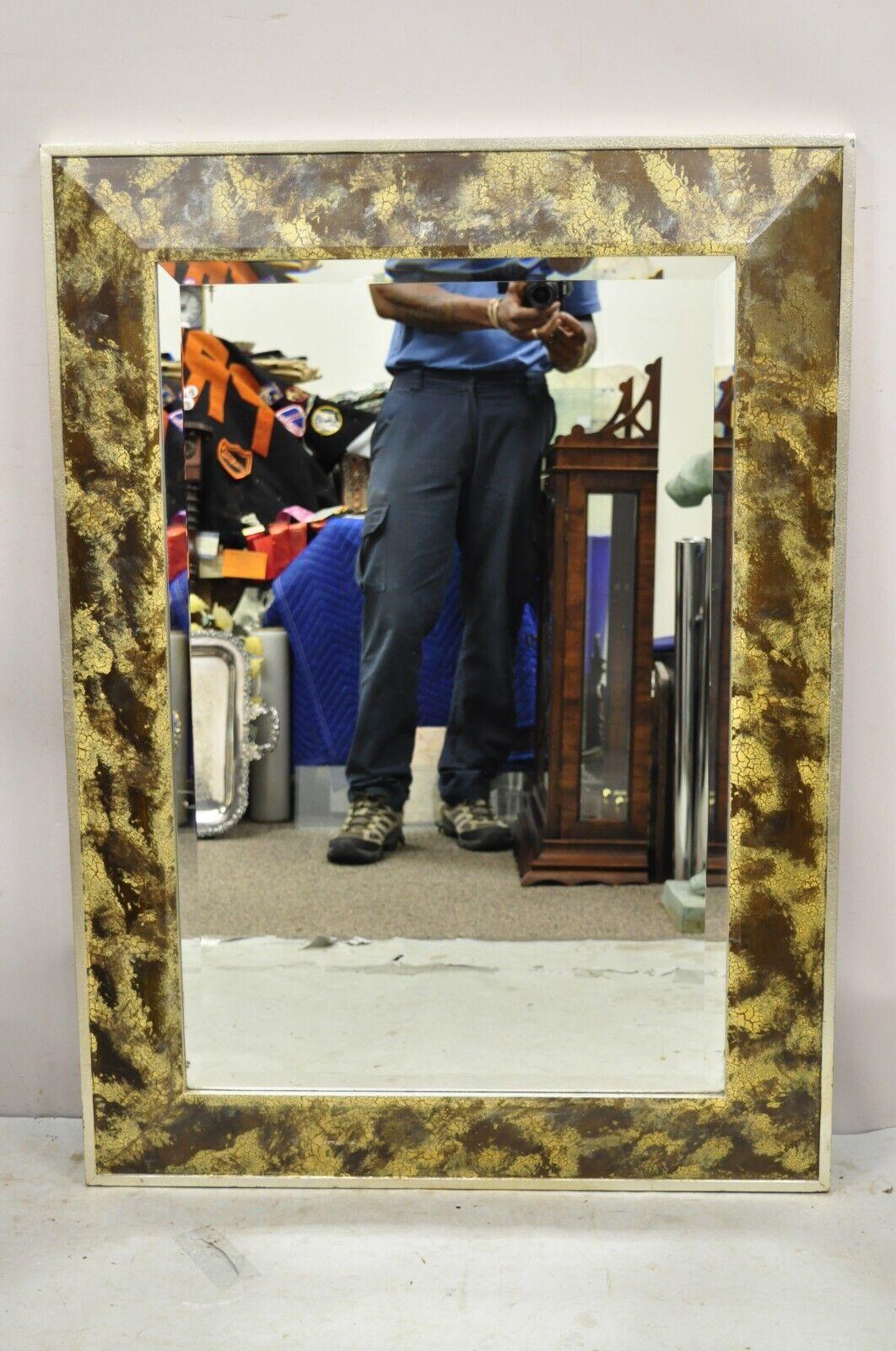 Decorative Arts Inc. Faux Tortoise Shell Painted Brown and Gold Modern Wood Frame Wall Mirror. Circa Late 20th Century.
Measurements: 33