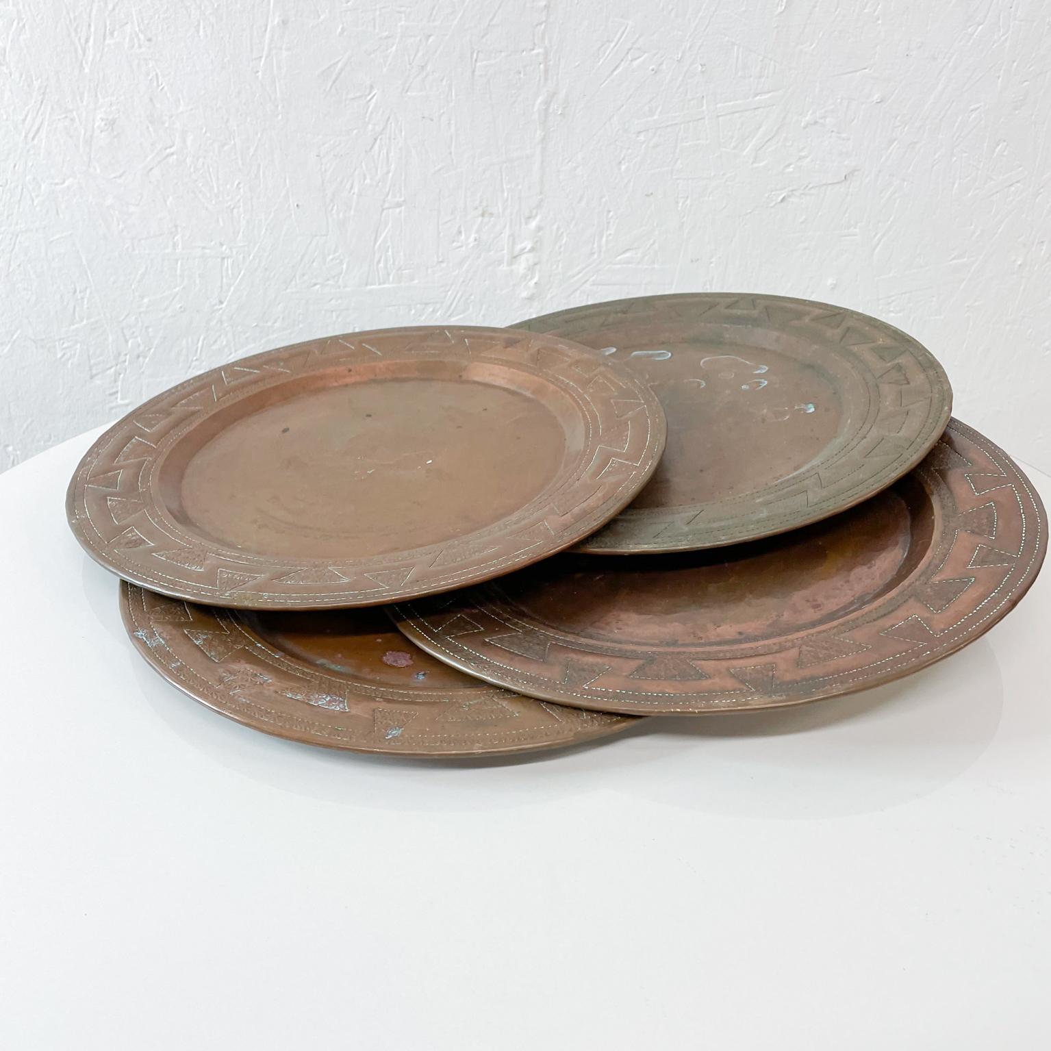 1950s Vintage Aztec Set of four Embossed Copper Plates Mexico In Good Condition In Chula Vista, CA