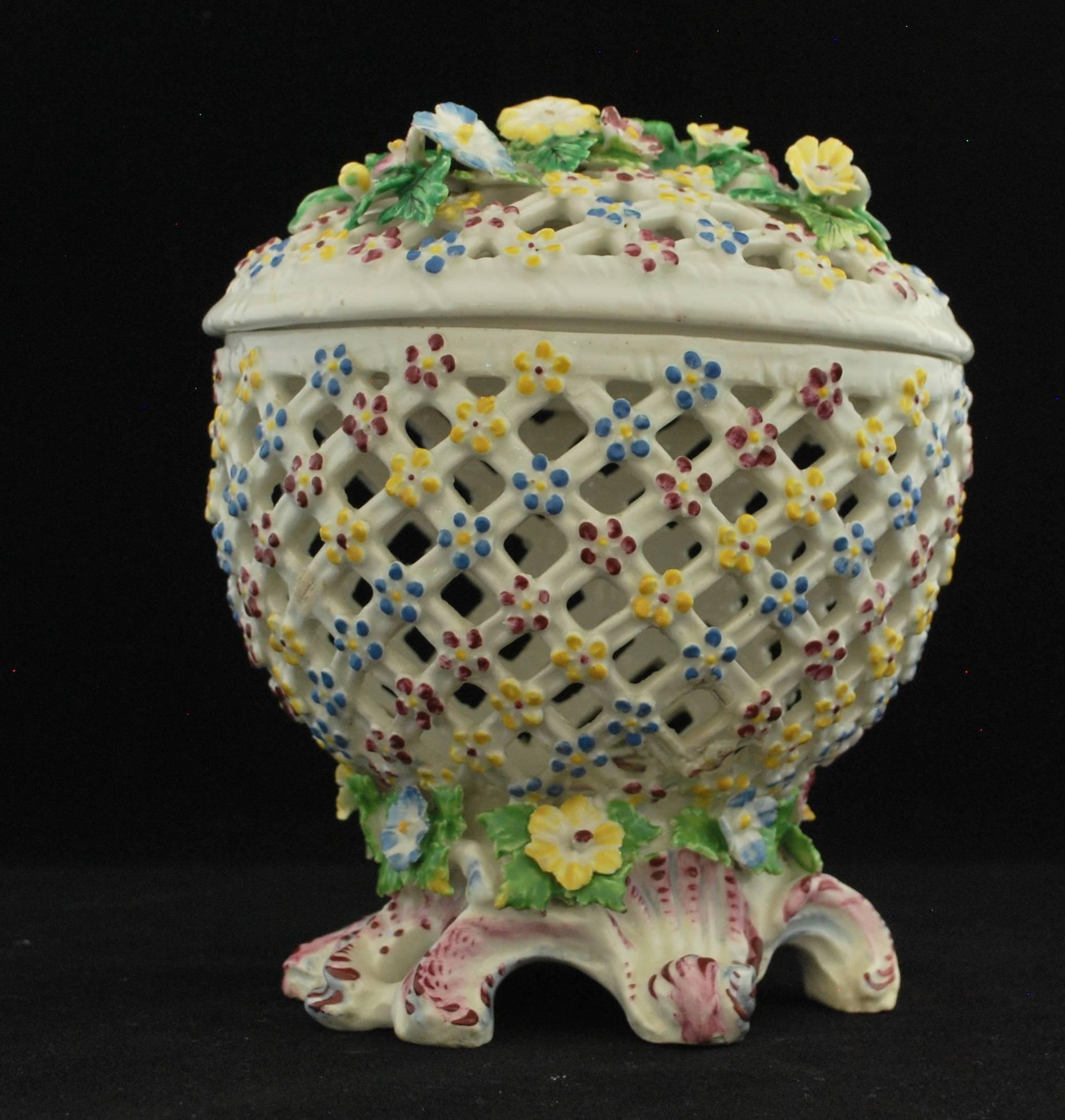 A pierced basket standing on a well-formed rococo base. Perhaps for potpourri, although the internal decoration suggests another use. We think probably oranges, chestnuts, etc.

Prov Taylor collection; Stockspring Antiques.
 