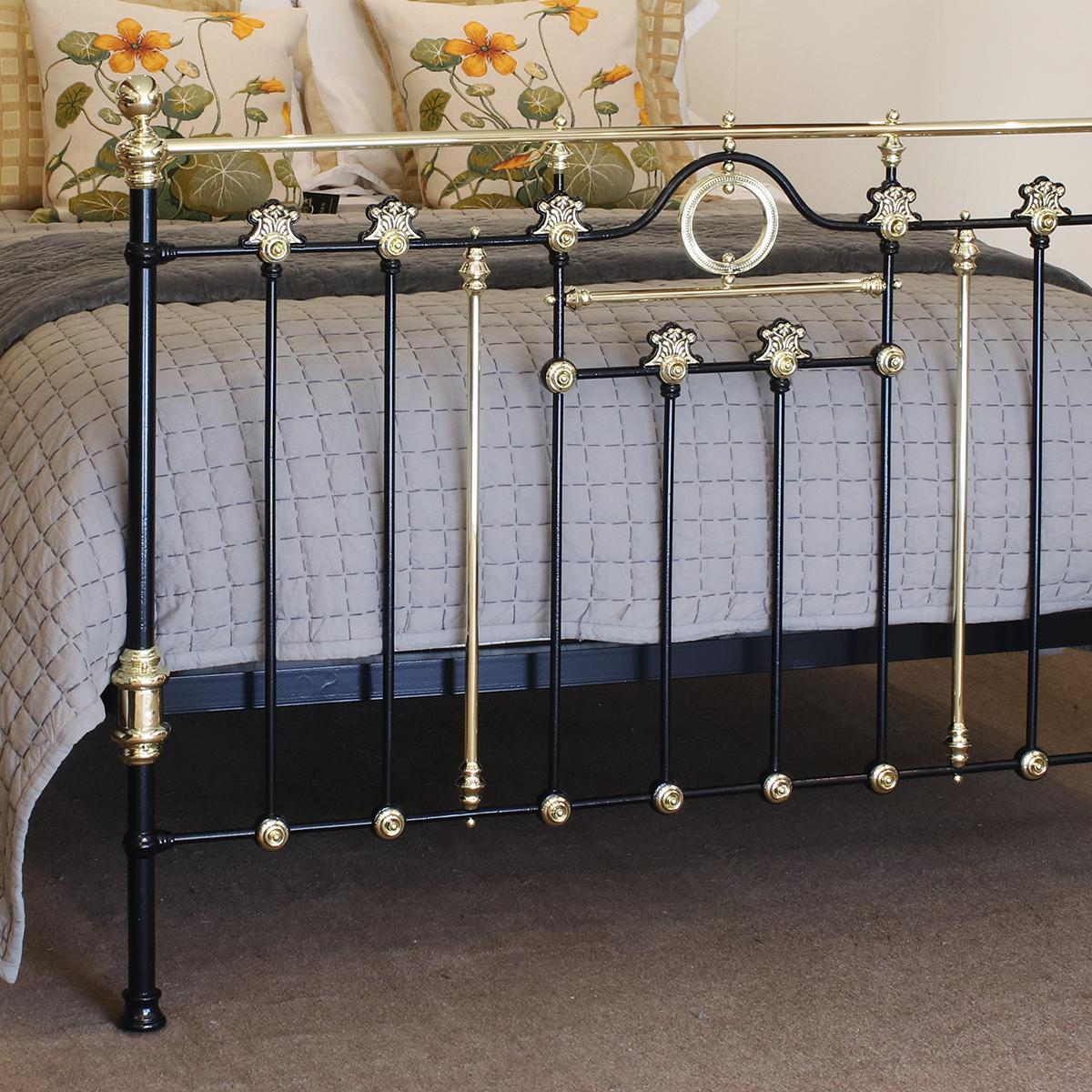 Antique bed in black with brass top rail, decorative castings and brass kneecaps.

This bed accepts a UK King size or US Queen size (5ft, 60in or 150cm wide) base and mattress set.

The price includes a standard firm bed base to support the