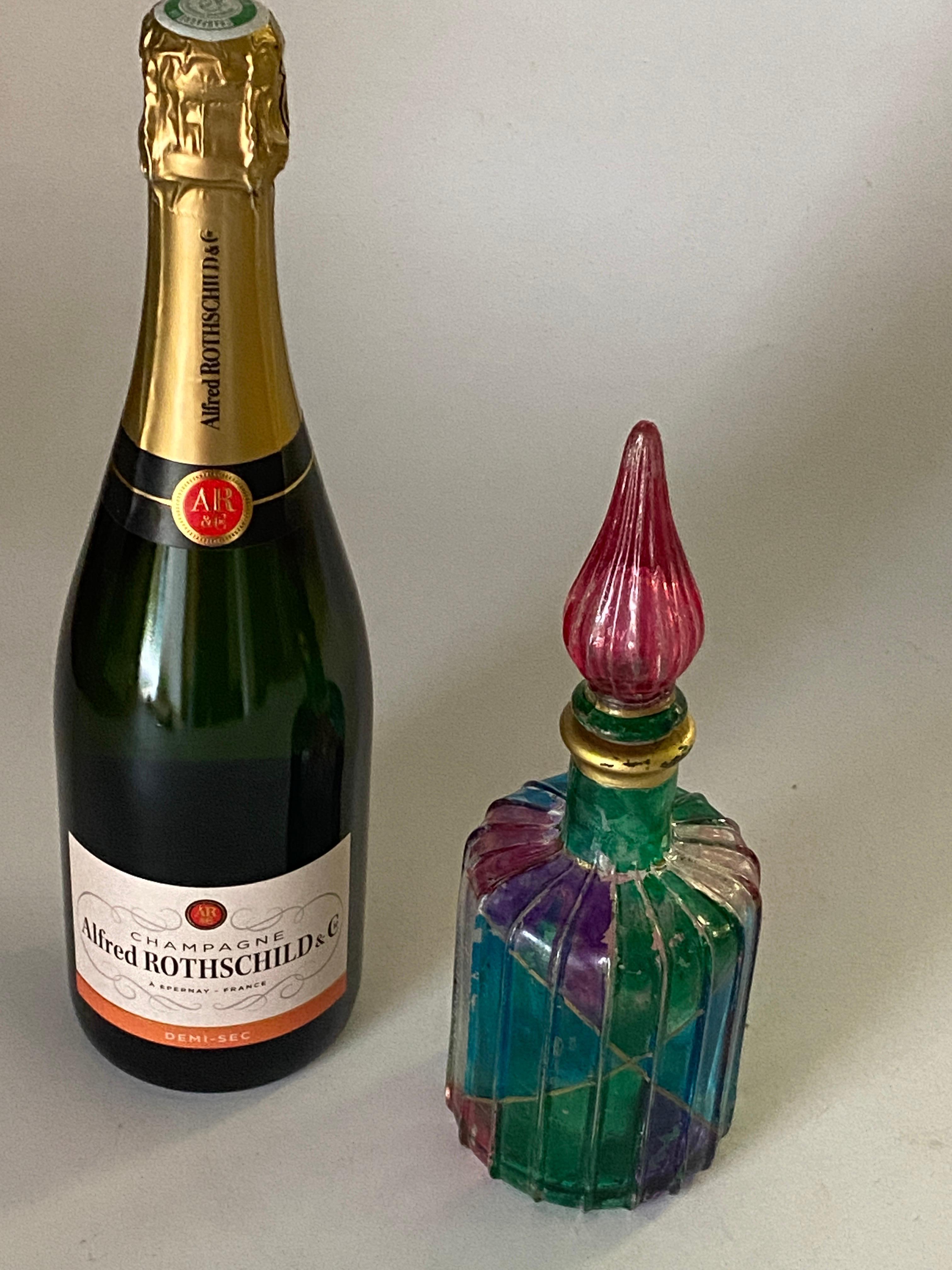 This pair of glass Decorative bottle, has been made in Italy in the 1970s.