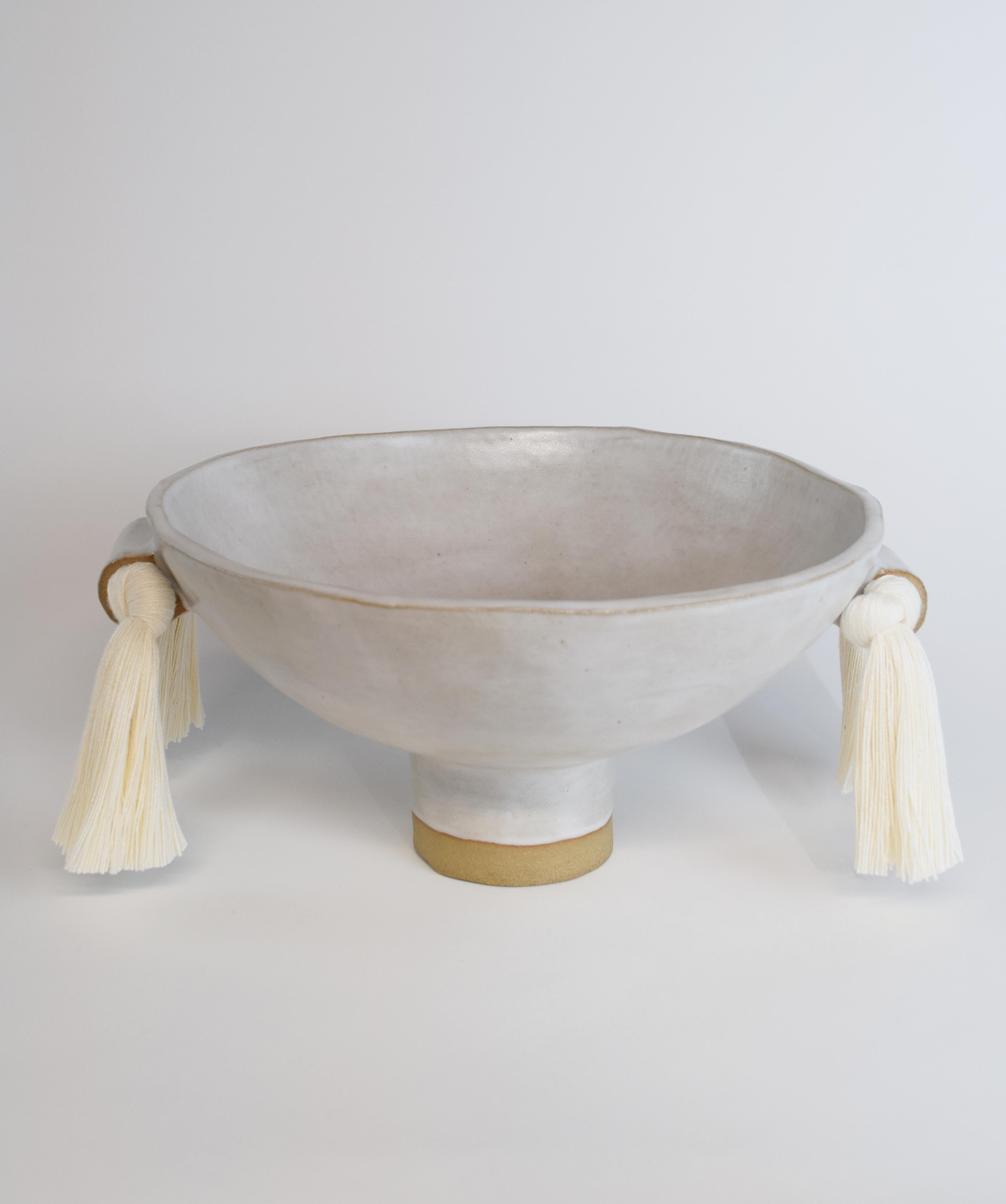 Decorative bowl #697 by Karen Gayle Tinney

A decorative bowl designed to compliment Vase #531, with similar sculptural details and ample surface area to make it function nicely as a fruit bowl or catch-all dish.

Handmade stoneware with white