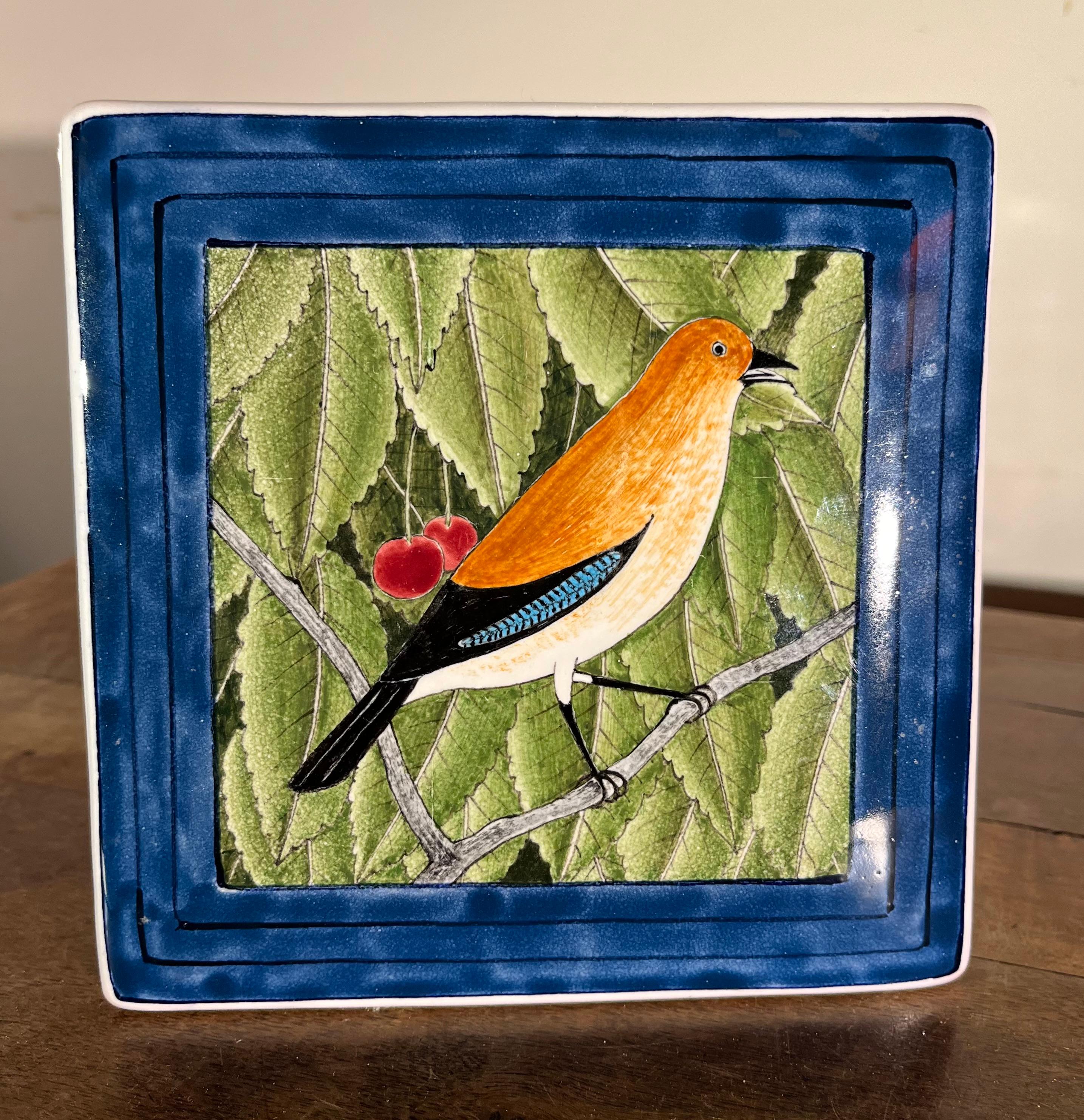 A charming decorated box with lid in hand-painted faience, by Claude (1927-2008) and Slavik (1920-2005) Palley. The Palleys created their pieces in Ivy-Sur-Seine France and were exclusively represented by Pierre Deux through the 70’s and 80’s. This
