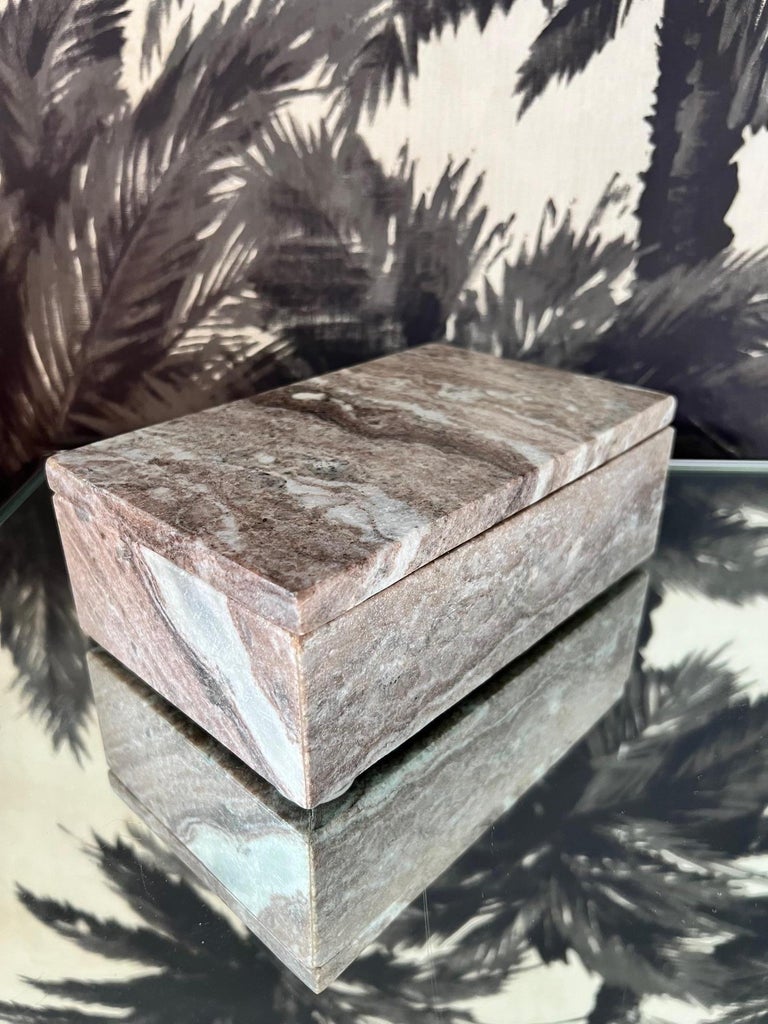 Organic Modern lidded box in exotic striped marble. The vintage box was handmade in Indonesia by local artisans. The stone box features polished edges with a distressed finish in variegated neutral colors of beige, brown, taupe, white, and gray.