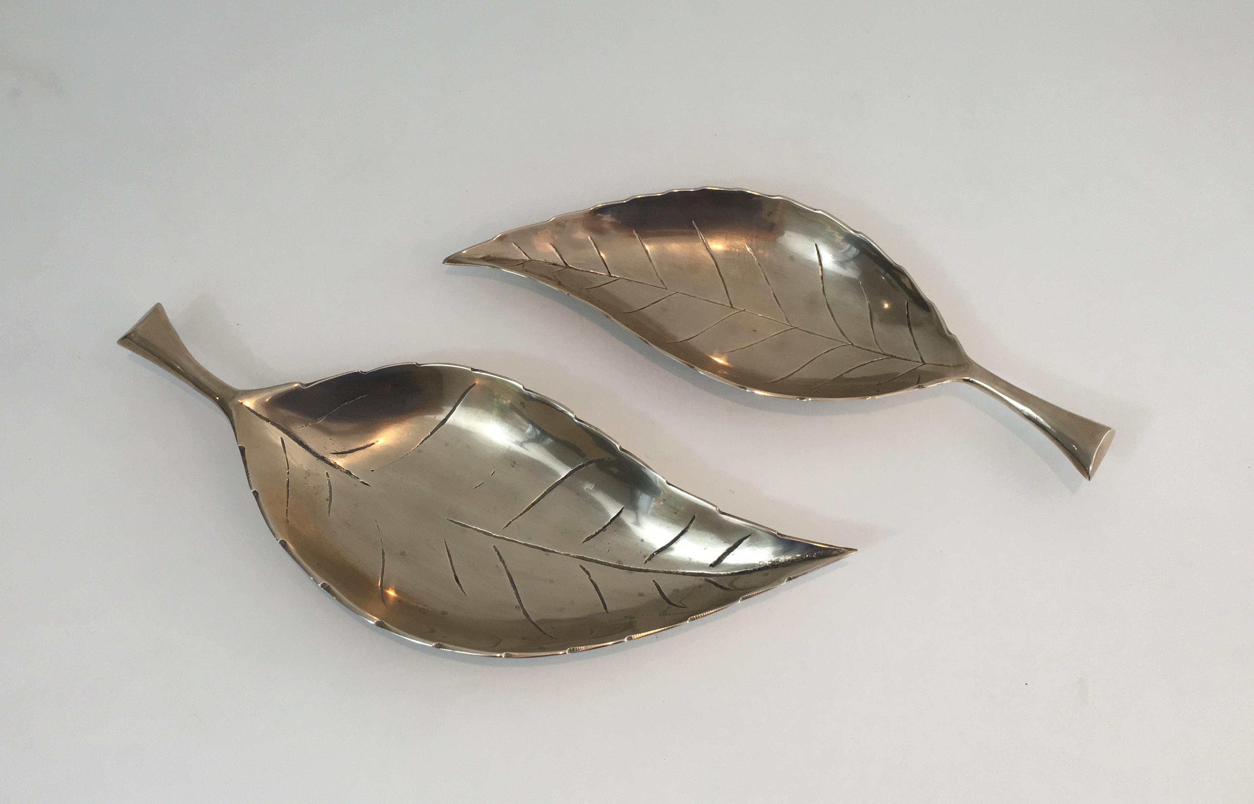 These decorative leaves are made of brass. This is a French work, circa 1970.