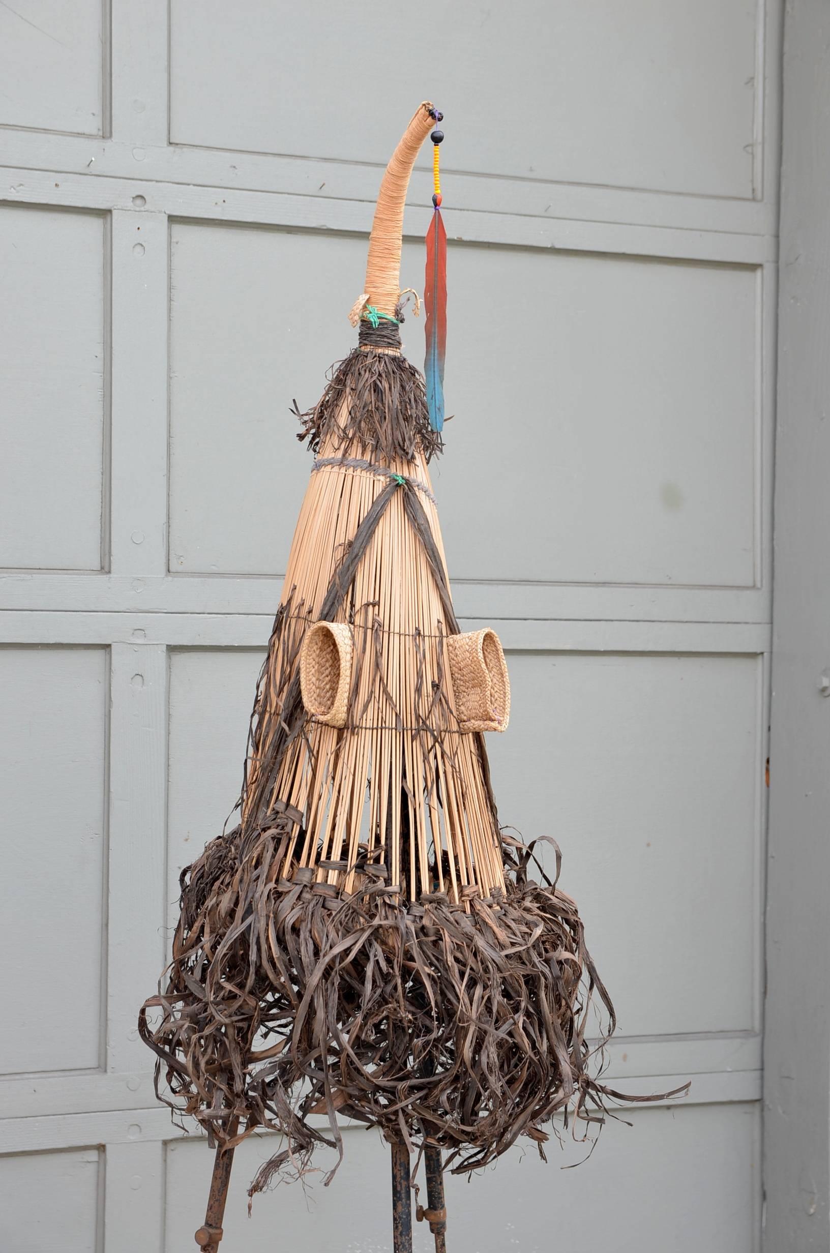 Decorative Brazilian Indian ceremonial mask on stand.