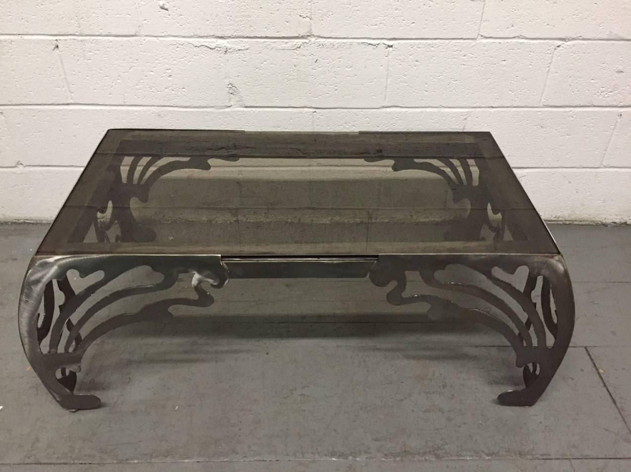 Decorative brushed steel coffee table.