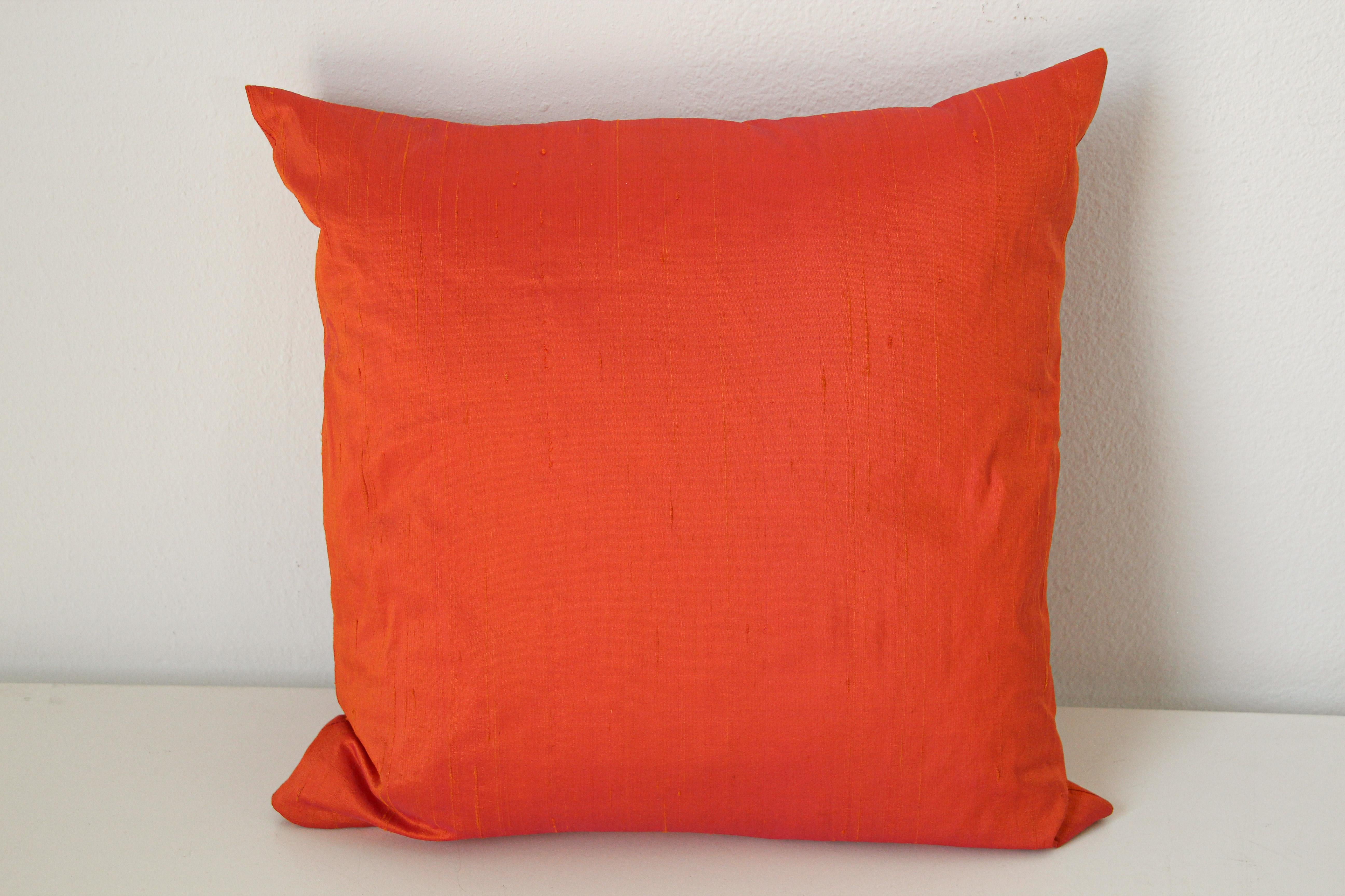 red orange throw pillows