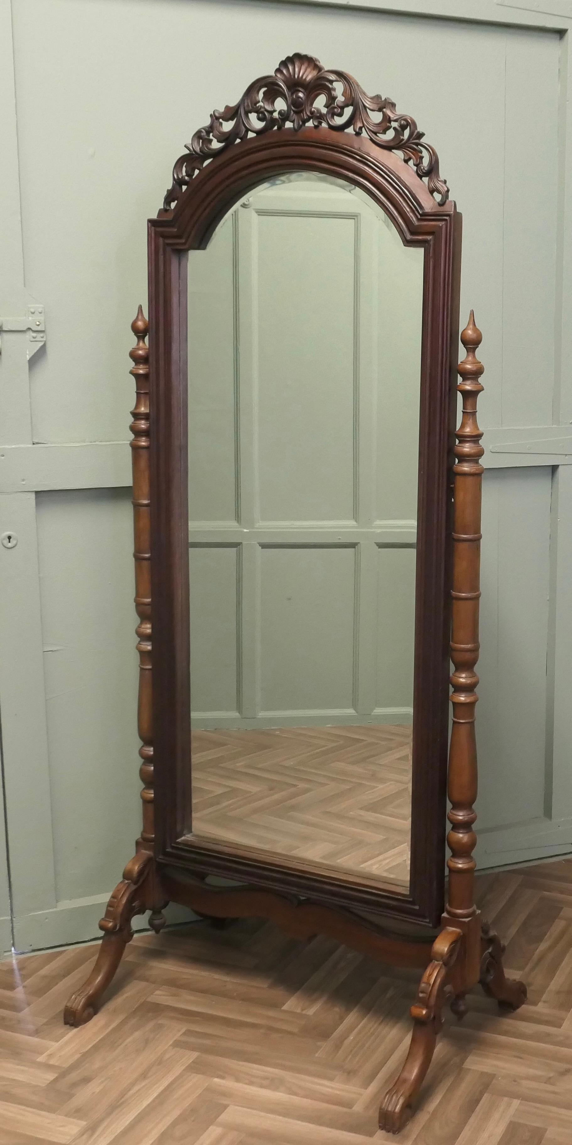 Decorative Carved Cheval Dressing Mirror

This lovely Mirror has a Shell and Acanthus pierced carved top, it sits firmly in its stand and swivels for maximum advantage
The Stand has carved Lions feet with delicately turned upright supports, the