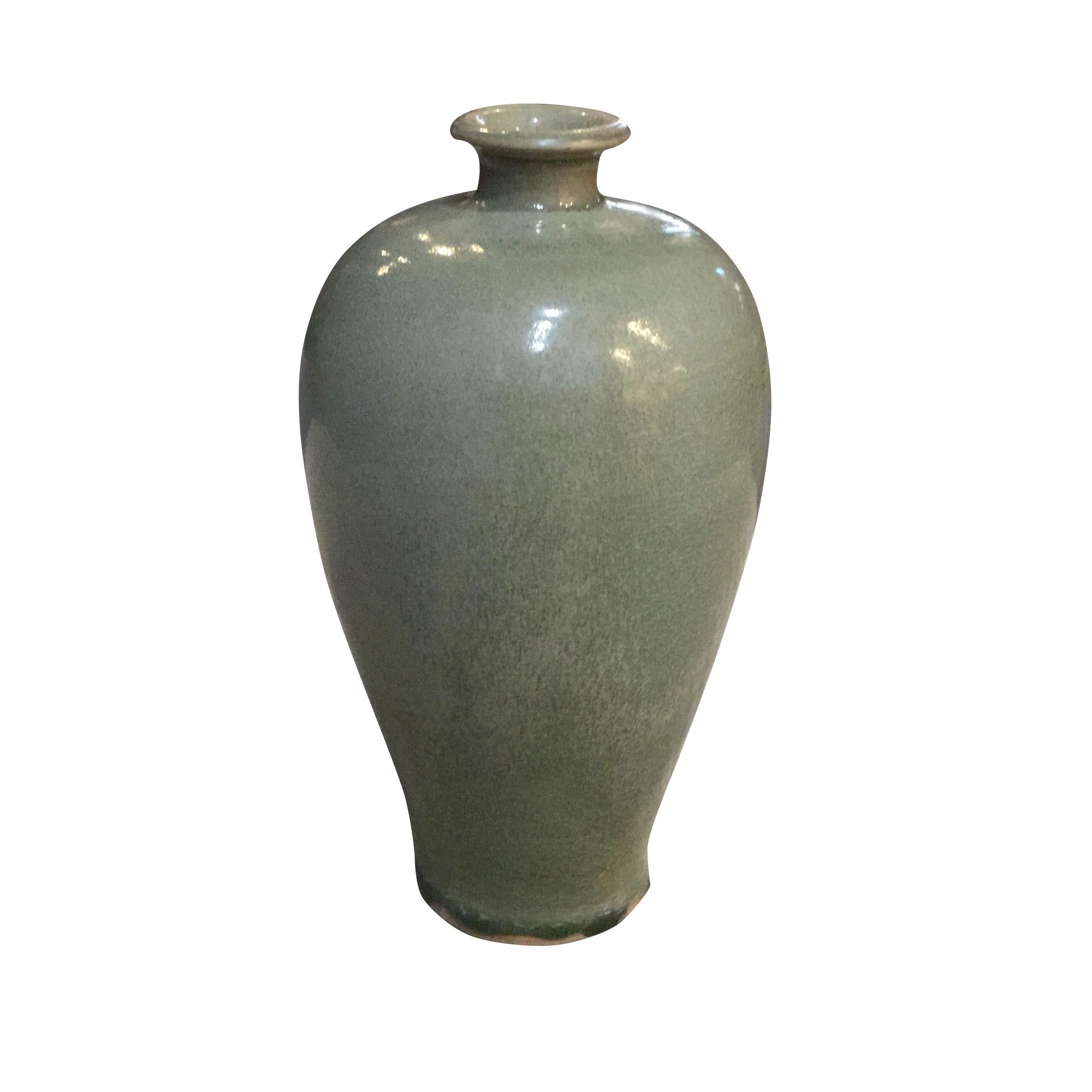 Contemporary Chinese celedon glazed ceramic vases.
Two are available and sold individually.
  