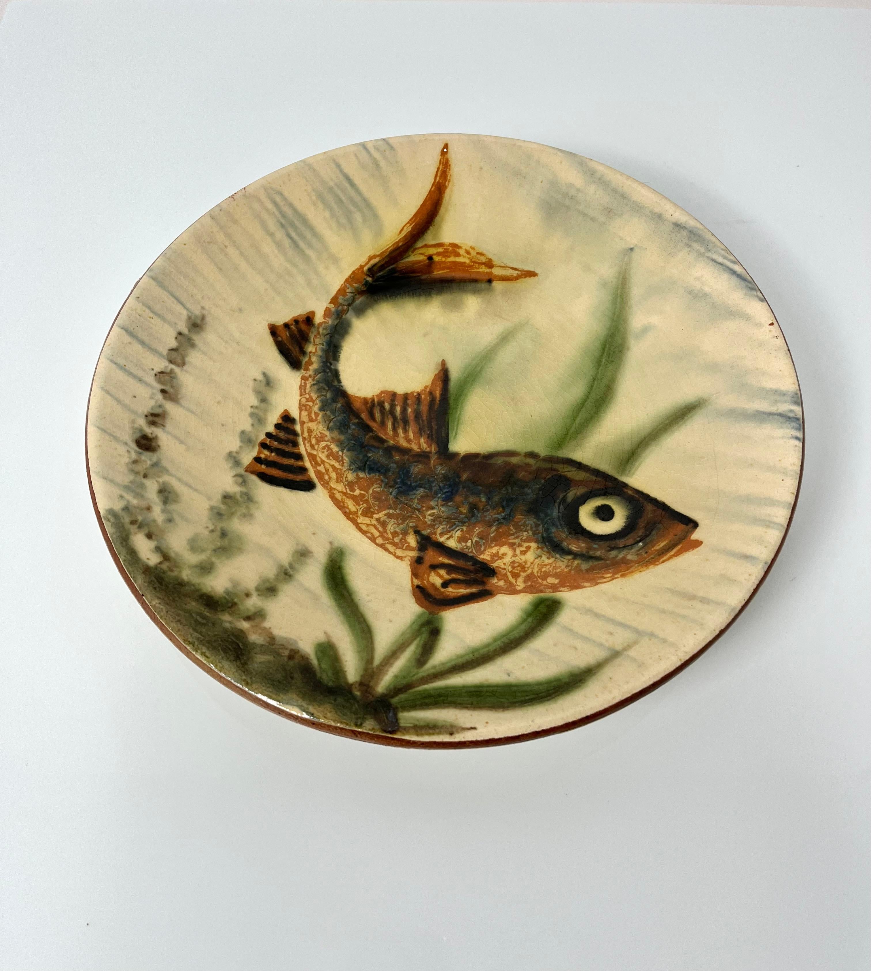 Decorative ceramic plate with fish decor by Puigdemont, Spain, 60’s
Can be hung on the wall
Signed below
