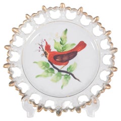Plato de cerámica decorativo con un pájaro