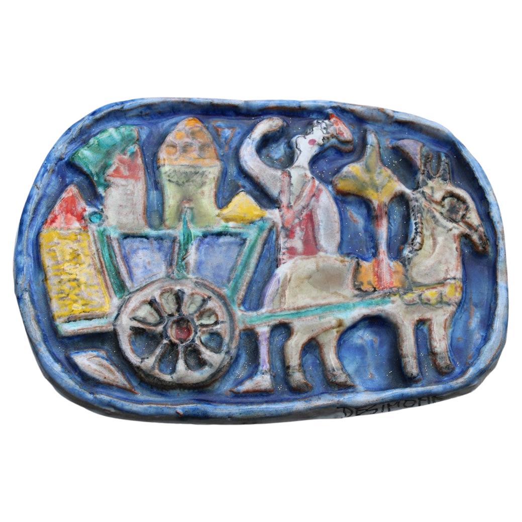 Assiette décorative en céramique avec personnages et chariot Giovanni De simone, années 1960