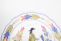 Assiette décorative en céramique avec pêcheur
