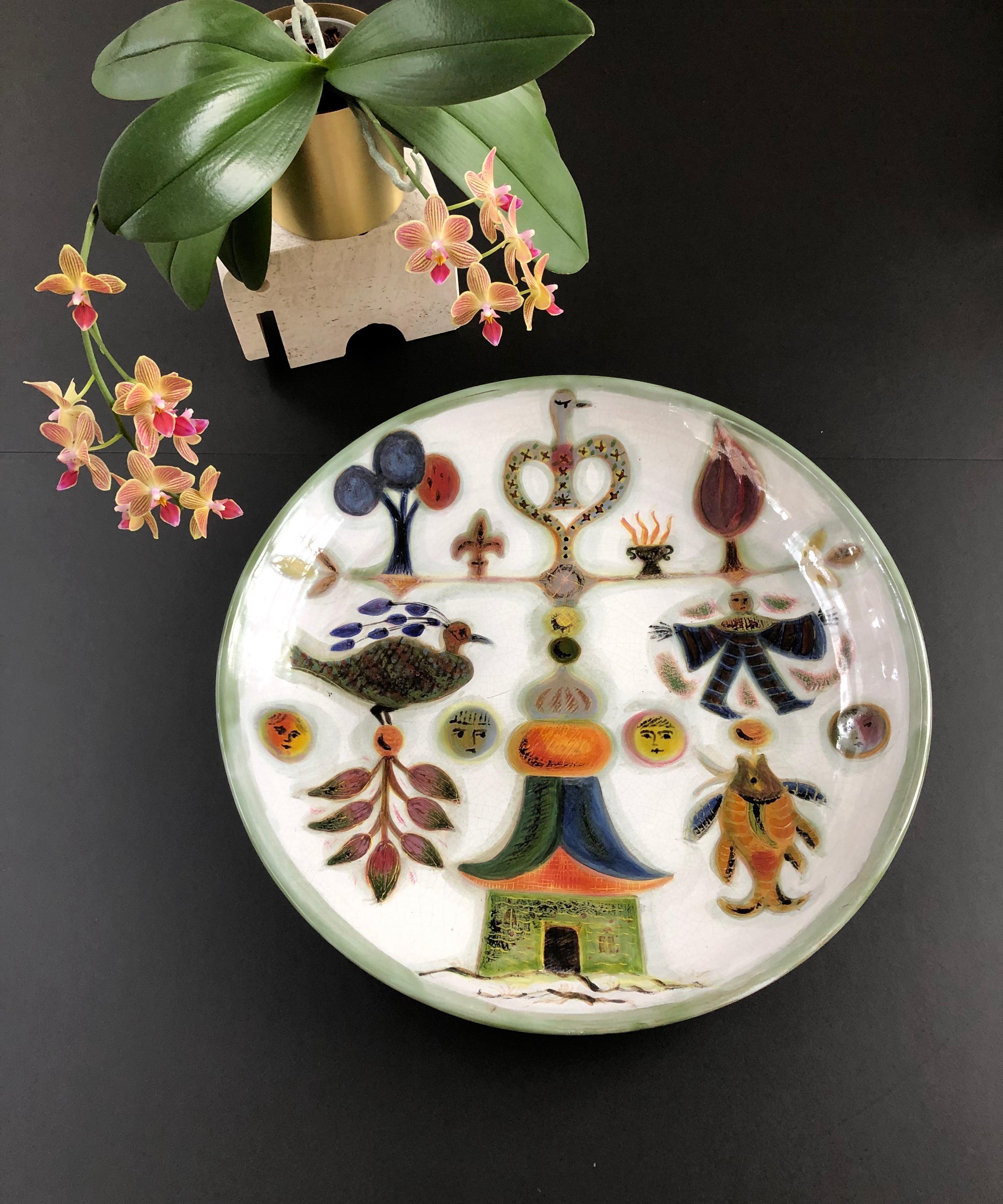 Decorative ceramic platter by David Sol, Sant Vicens pottery, circa 1950s. Truly a unique piece, there is an Asian motif in the design accented by rich, textured colouring. Sublime. In this large platter there is a pagoda-like structure, a partridge