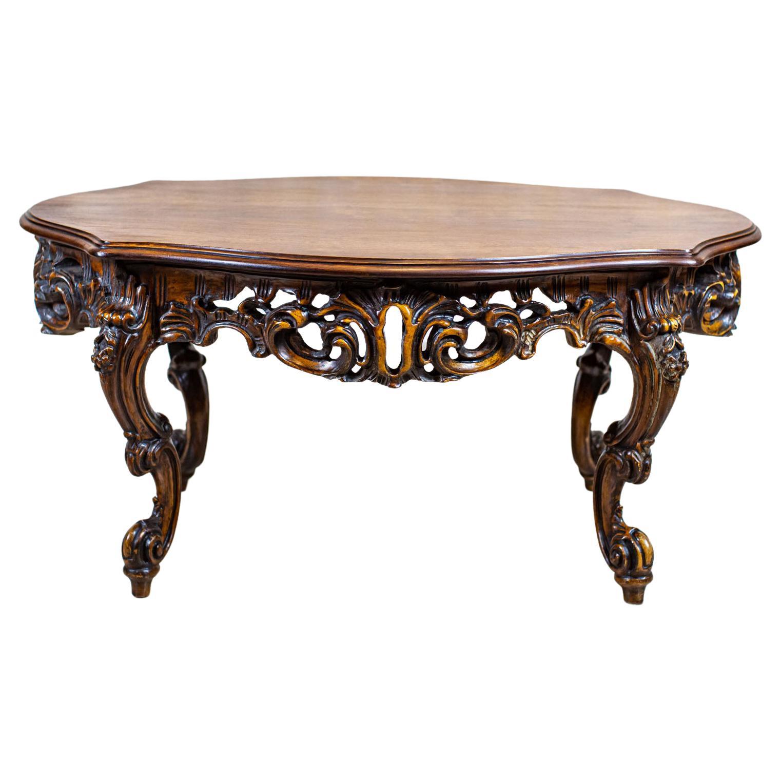 Decorative Brown Coffee Table from the Mid 20th-Century with Carved Apron For Sale