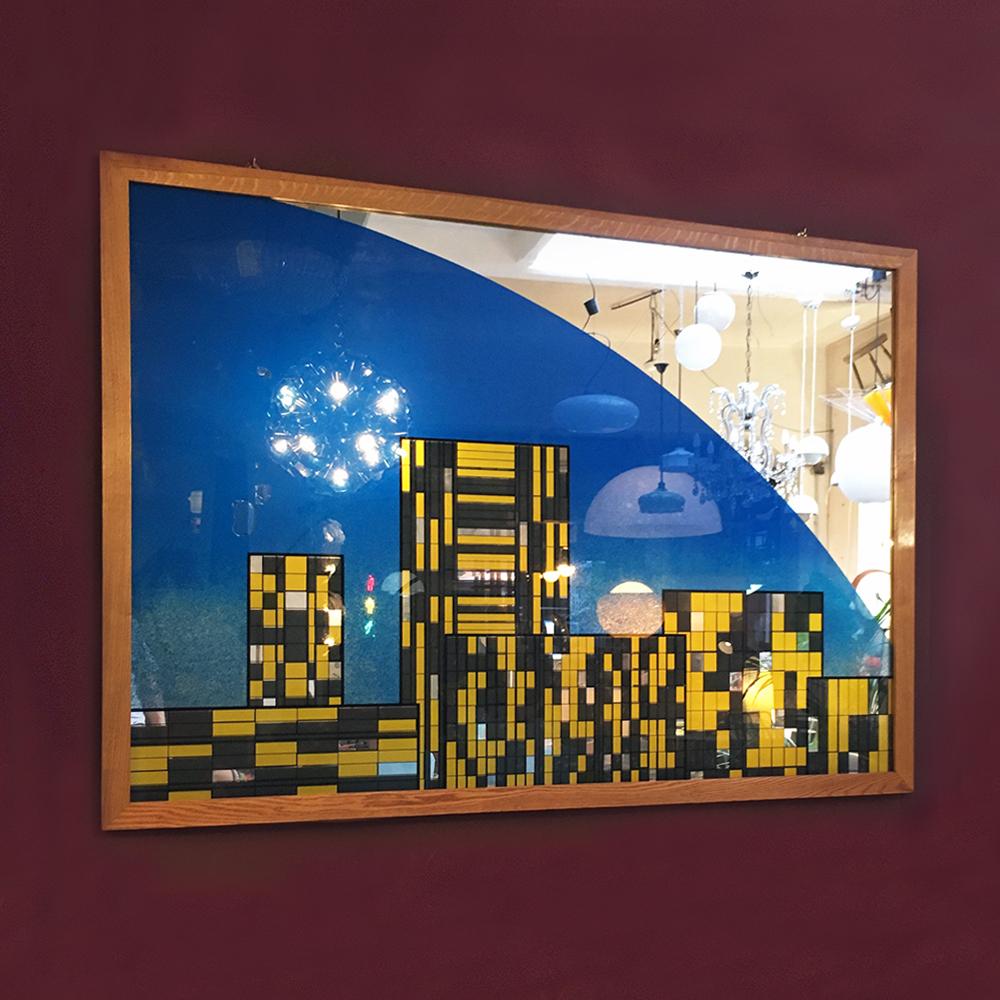 Decorative colored mirror with wood frame, 1980s
Big decorative colored mirror, dating to the 1980s. Big mirror with wood frame and coloured glass, showing Manhattan, like evidenced by the signature. Glass coloured in blue, black and yellow.
Good