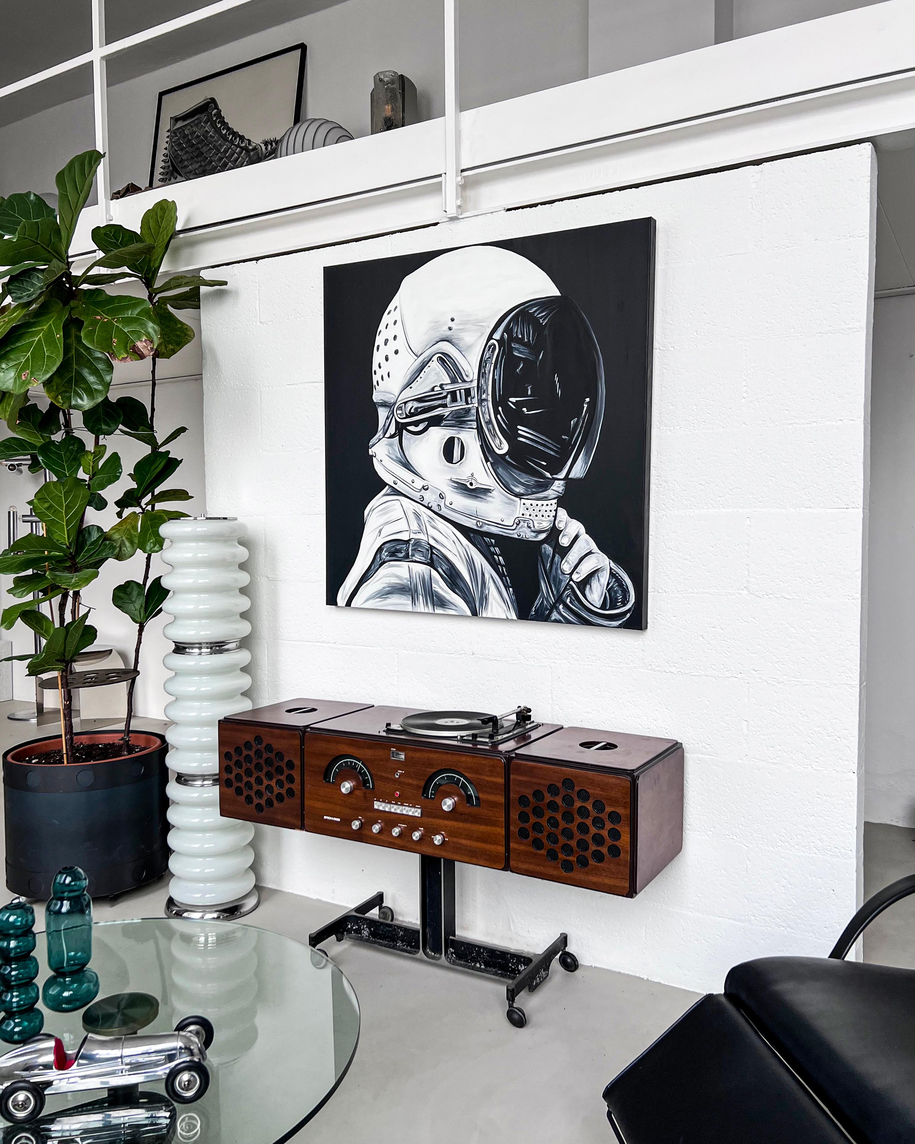 Black and white original painting (not a print), depicting a cosmonaut in his space suit and helmet. It is the work of Spanish artist Ricardo Rodriguez, and is a big canvas measuring one meter by one meter (40 x 40 inches). It is highly decorative