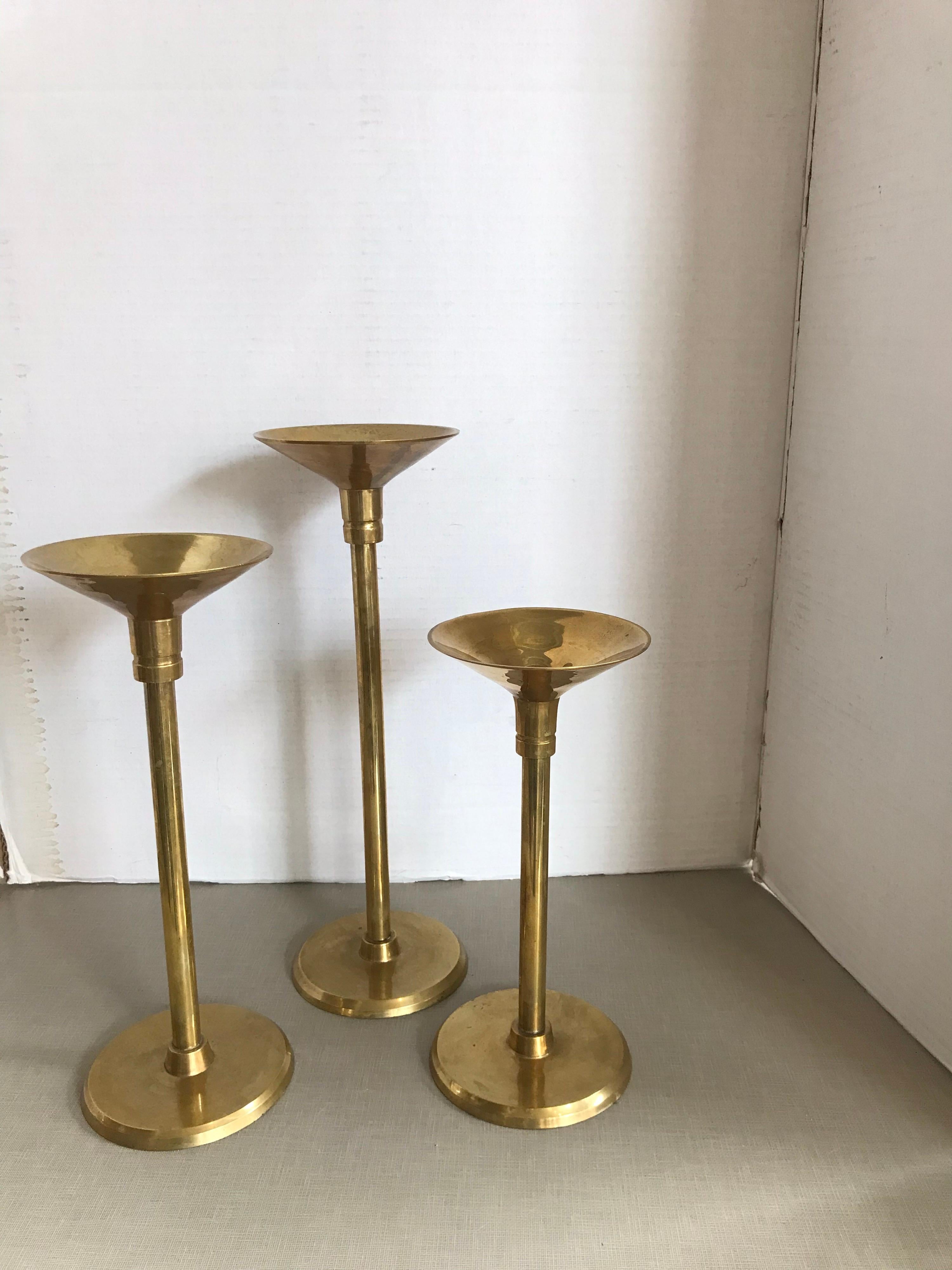 This is a set of brass candlesticks made by decorative crafts company in 1970s.