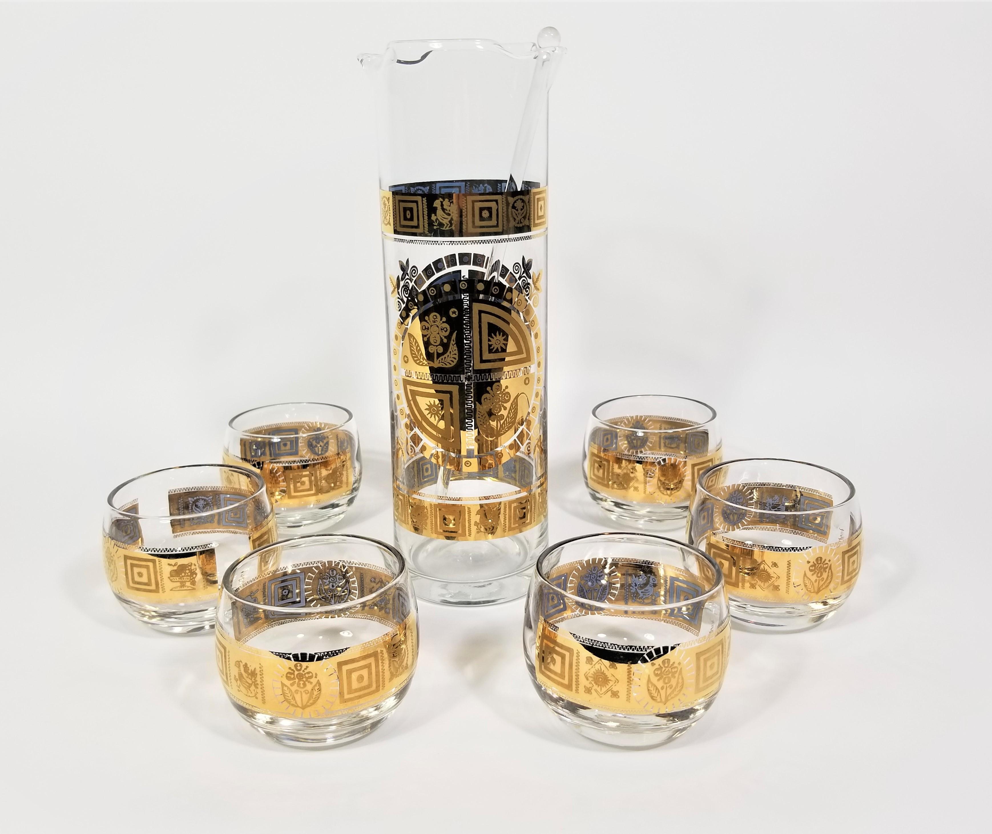 Mid Century 1960s 22K Gold Culver Cocktail Glassware Barware Set. Includes Martini Pitcher and 4 oz Mod Shaped Roly Poly Glasses. A perfect addition to any home bar or bar cart. All are Signed and in Excellent Condition. 

Measurements:
Martini