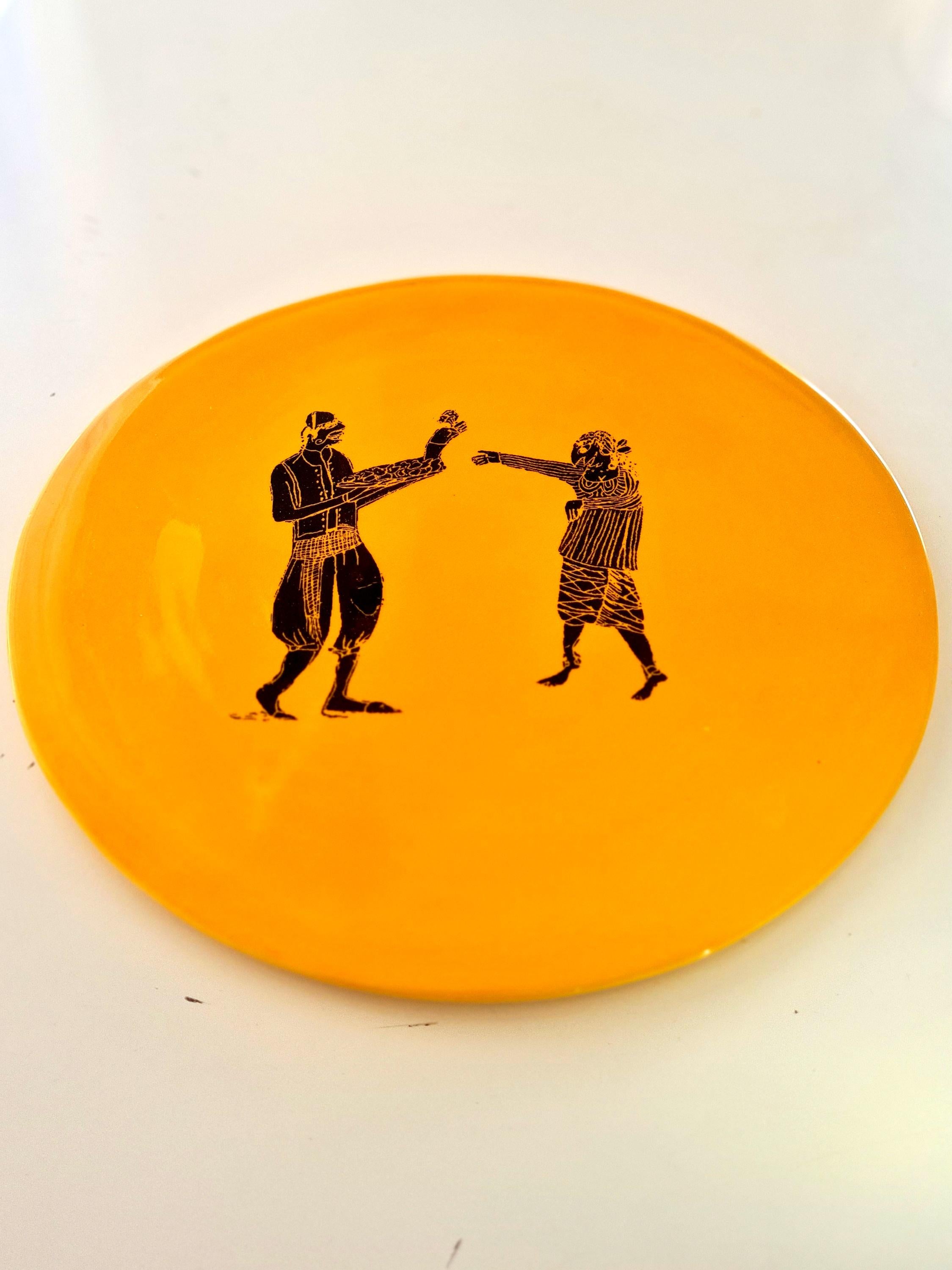 Discover the MEDINA Collection, an exclusive series of 10 presentation plates with a 30 cm diameter, where each design tells a story inspired by traditional Tunisian folklore. Signed by the artist Meriem Bouderbala, this unique collection seamlessly