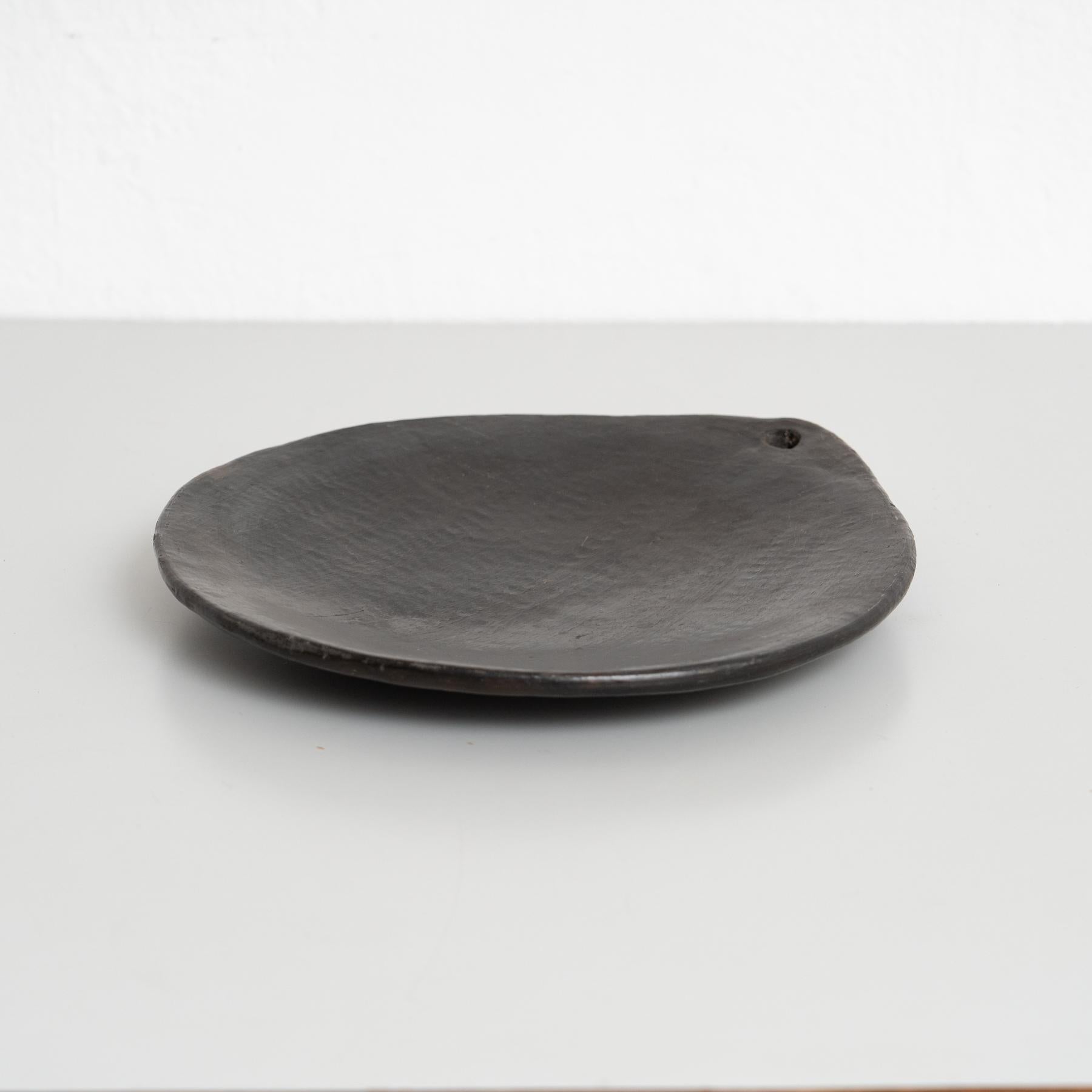 Decorative earthenware tray, by an unknown designer.  Manufactured in Spain, circa 1950.    In good original condition, with minor wear consistent with age and use, preserving a beautiful patina.    Materials:  Earthenware.