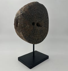 Decorative Element Made of a Millstone on a Steel Base