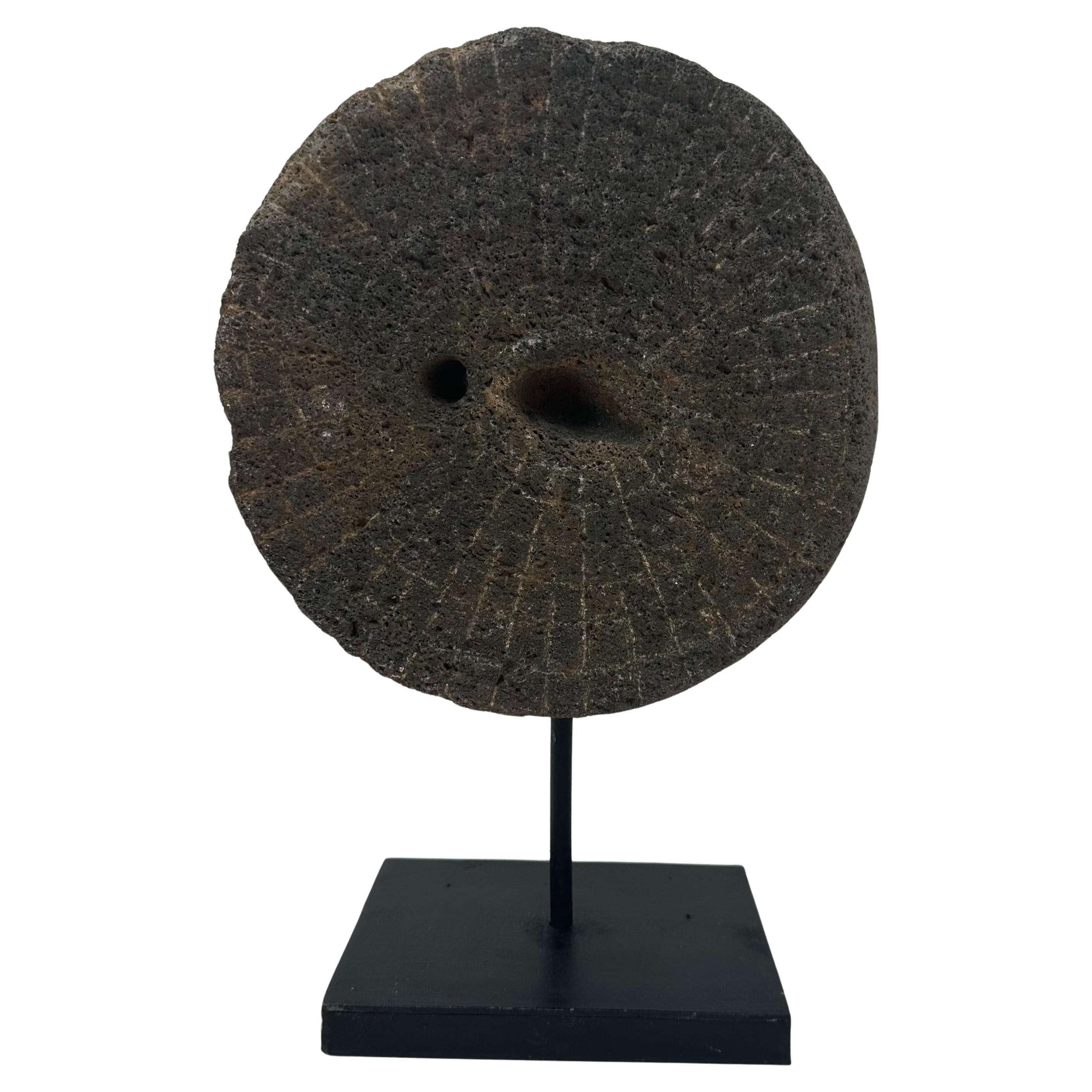 Decorative Element Made of a Millstone on a Steel Base en venta