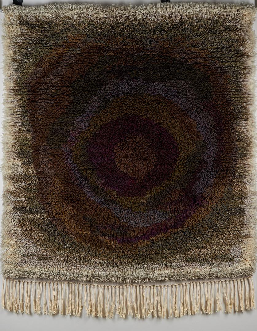 Rare mid century wool rug / wall textile designed by Uhra Beata Simberg Ehrström in 1966 and hand made by Pirkko Sillfors in 1976. 
In good original condition. A very decorative wall hanging rug with a nice color combination of different earthy