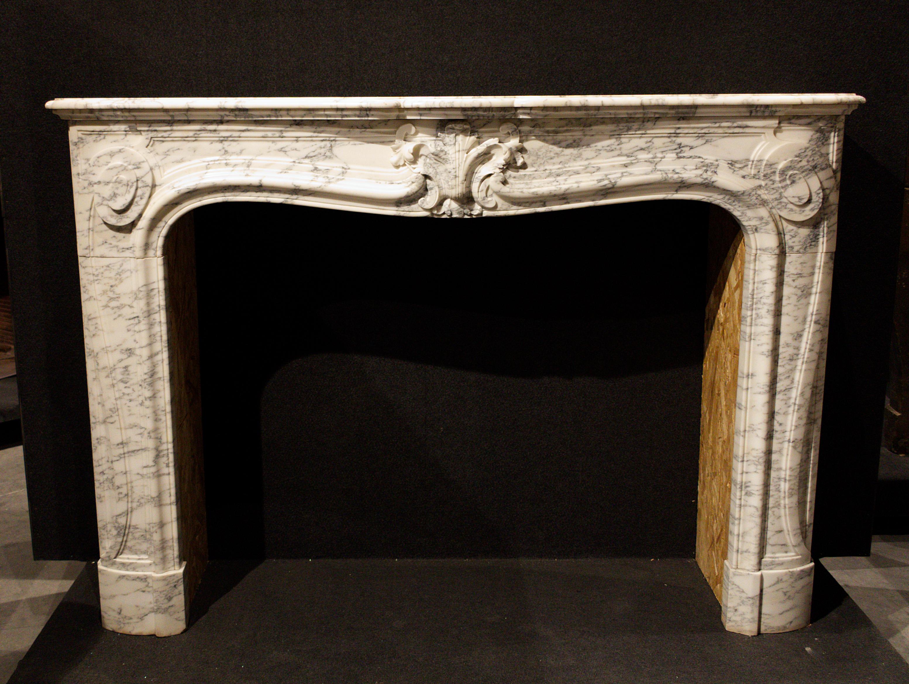 Truly stunning multicolored marble fireplace mantel with ornamental carving of exceptional quality. This grand decorative fireplace is sure to be the most captivating focal point in your classy, sophisticated interior.

The most captivating beauty
