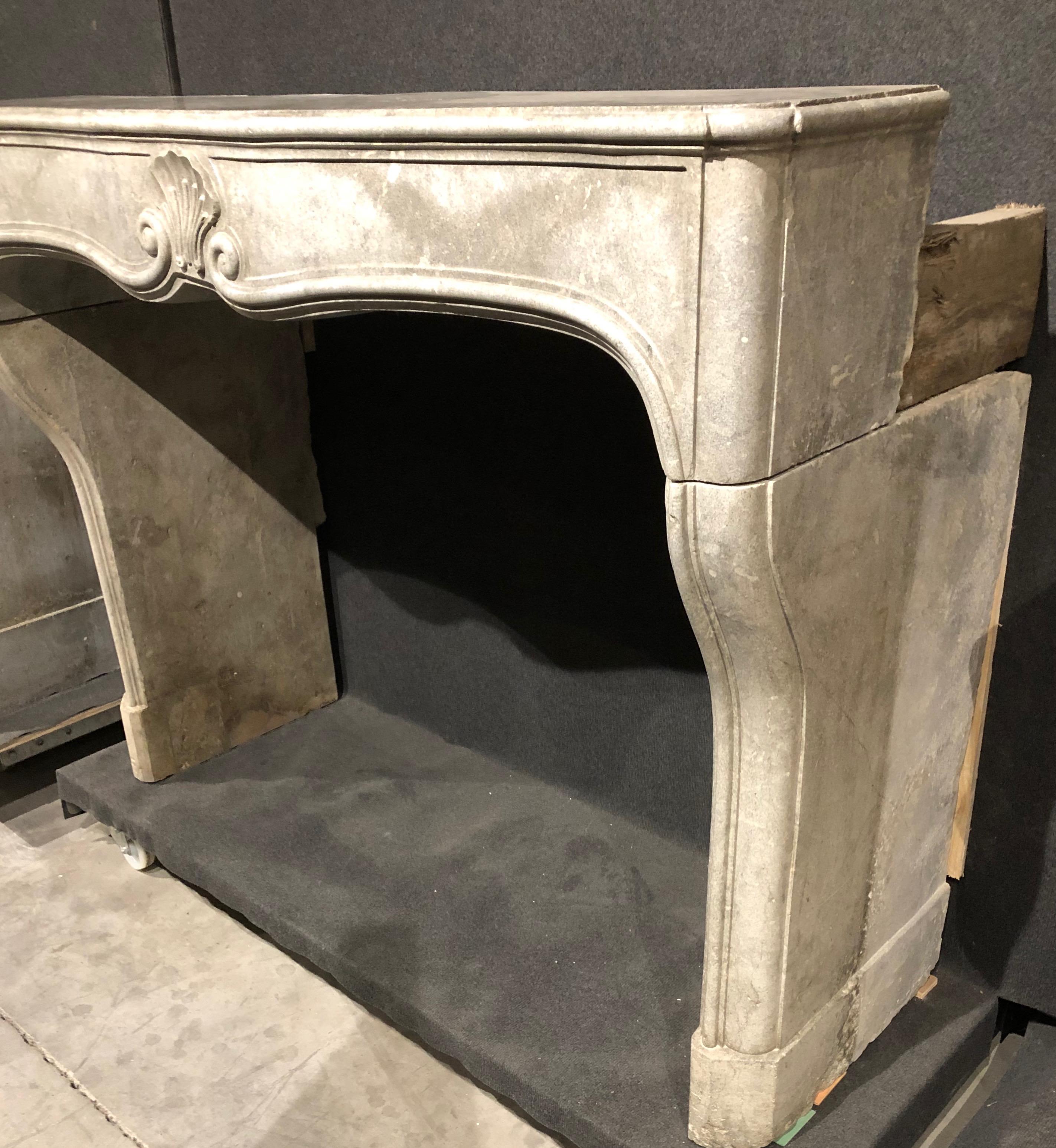 Carved Decorative Fireplace Mantel in the Style of Louis XV For Sale