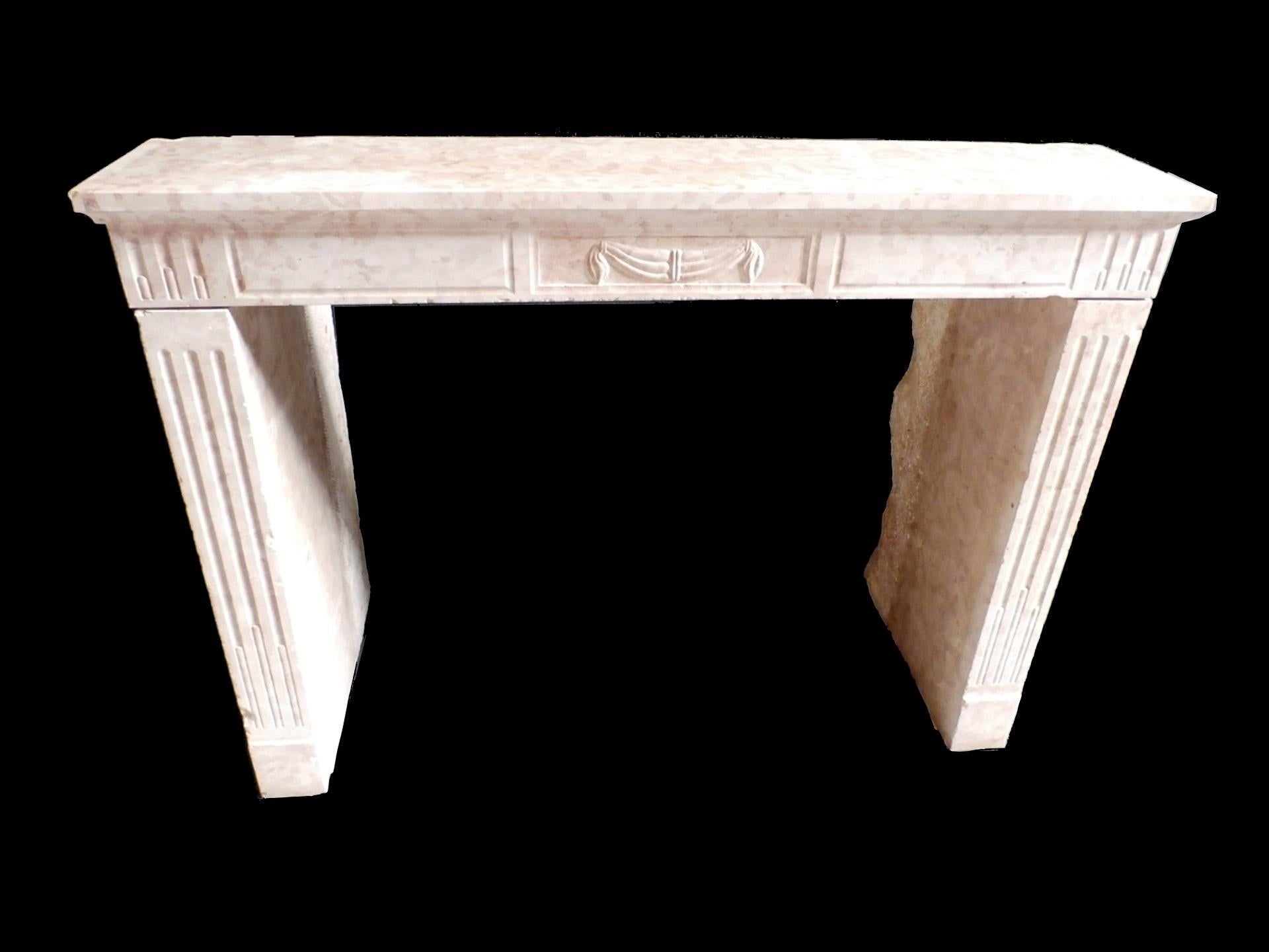 An elegant, understated piece of simple beauty. This beige/burgundy toned fireplace mantel, with more geometrical carving, will add the finishing touch to your modern or classic living room.

If you are looking for the perfect piece to complement