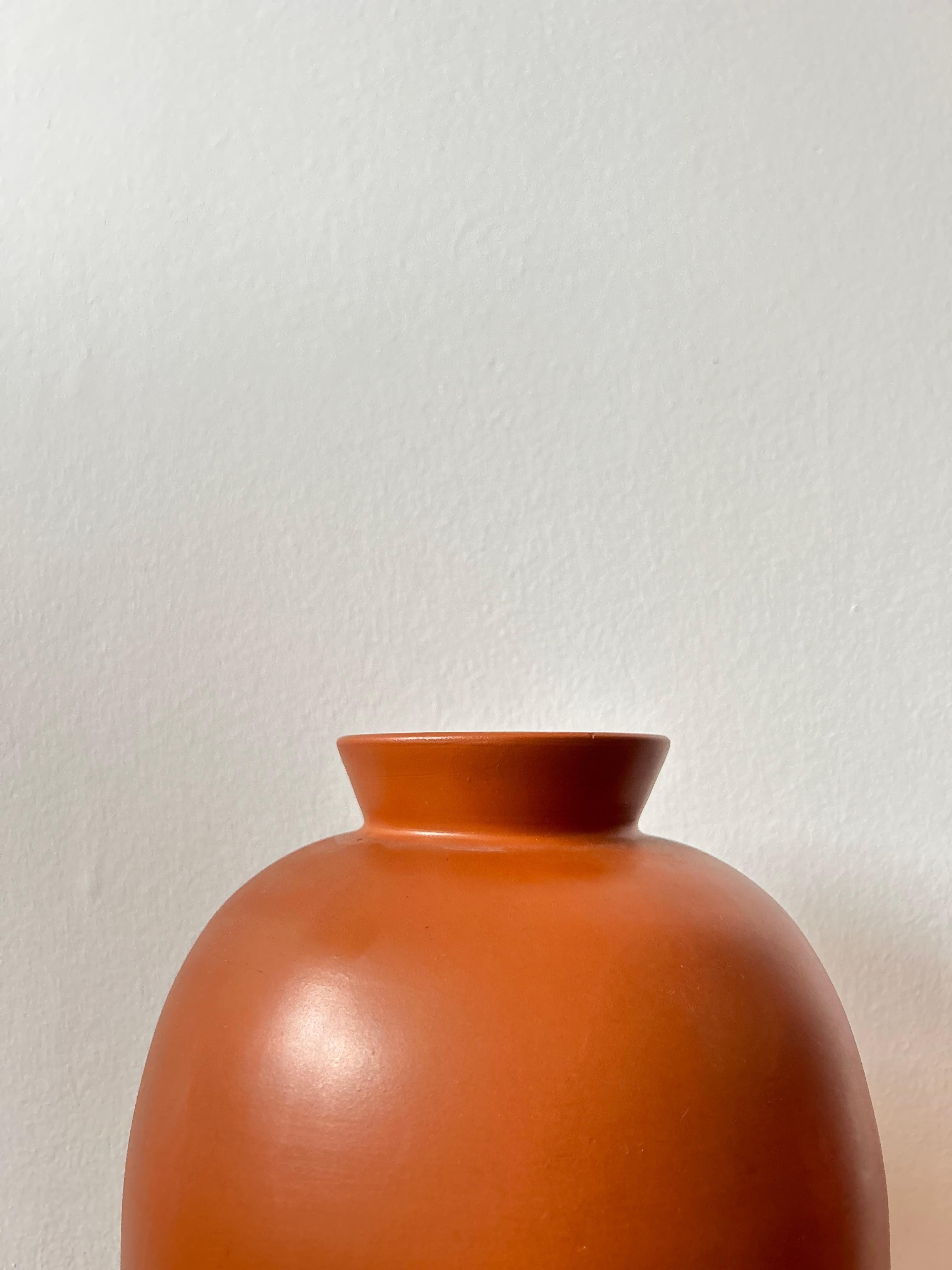 Elevate your interior decor with this exquisite 45 cm tall floor vase crafted by the renowned Swedish manufacturer Upsala Ekeby during the 1960s. This striking piece is a testament to Scandinavian design excellence, combining both form and function