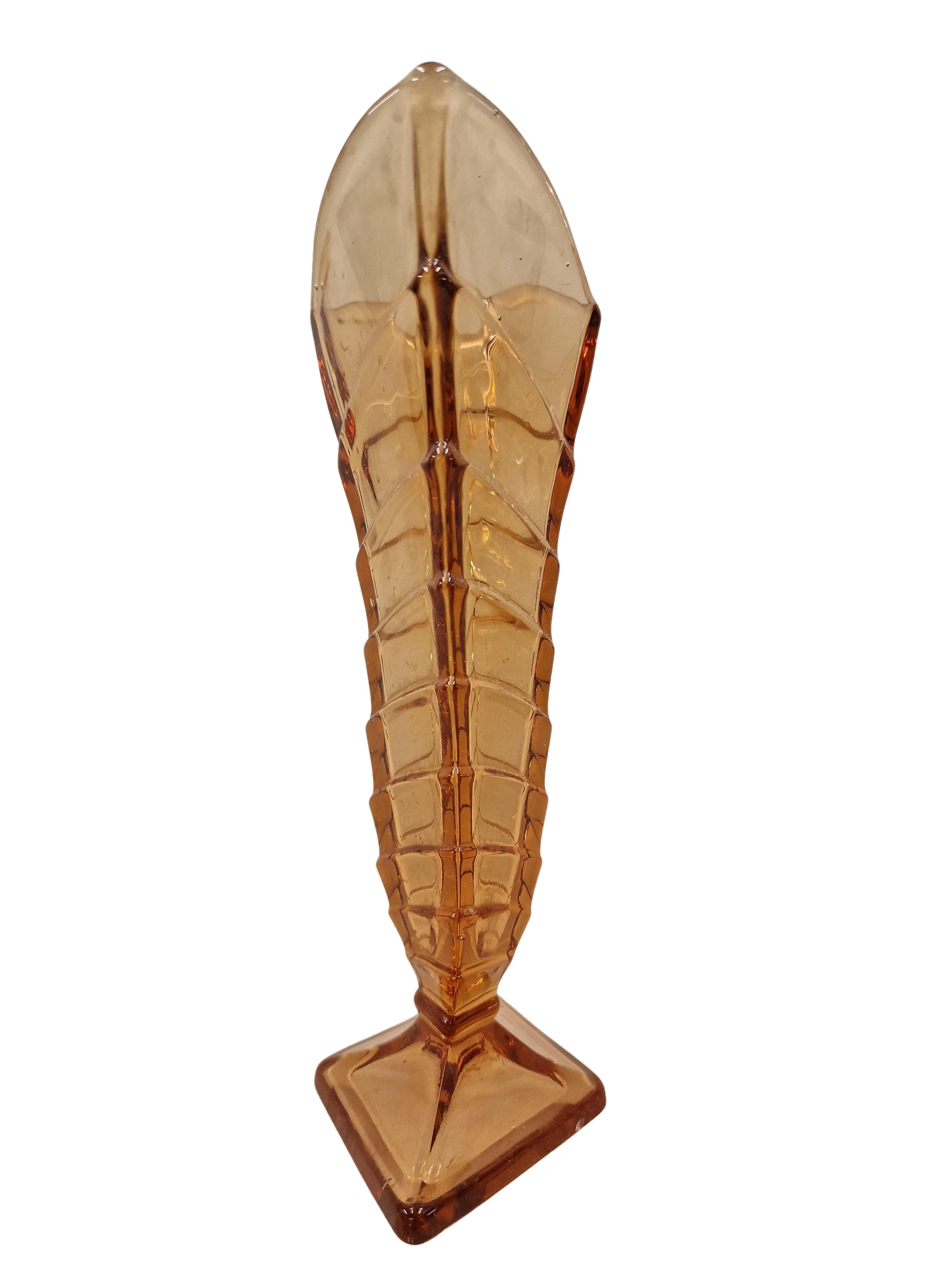 An extremely decorative flower vase, an original from the Art Deco period, most likely from the well-known German manufacturer Walther Glas.

The vase has a square base, which then extends upwards in a staircase-like structure and then ends again in