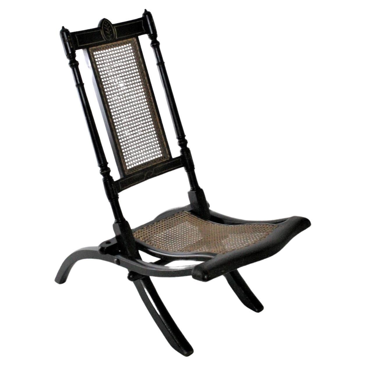 Decorative Folding Victorian Chair with Cane Seat Ebonised with Gilt detailing