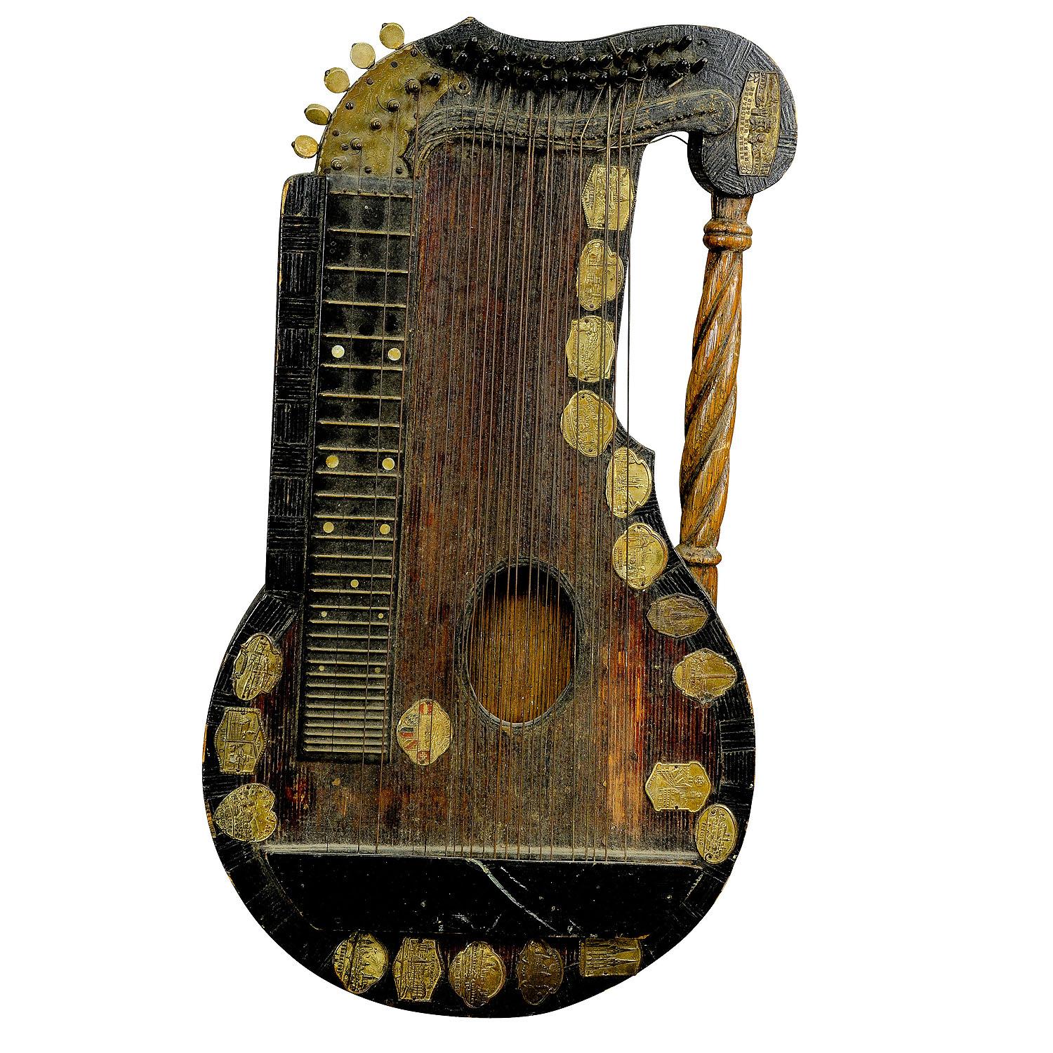 Decorative Folk Art Zither made of Matchsticks by a Wayfarer

An unusual zither model completely made of matchsticks which where glued together and carved afterwards. Handmade most probably by a wayfarer in the 1920s. The zither is decorated with