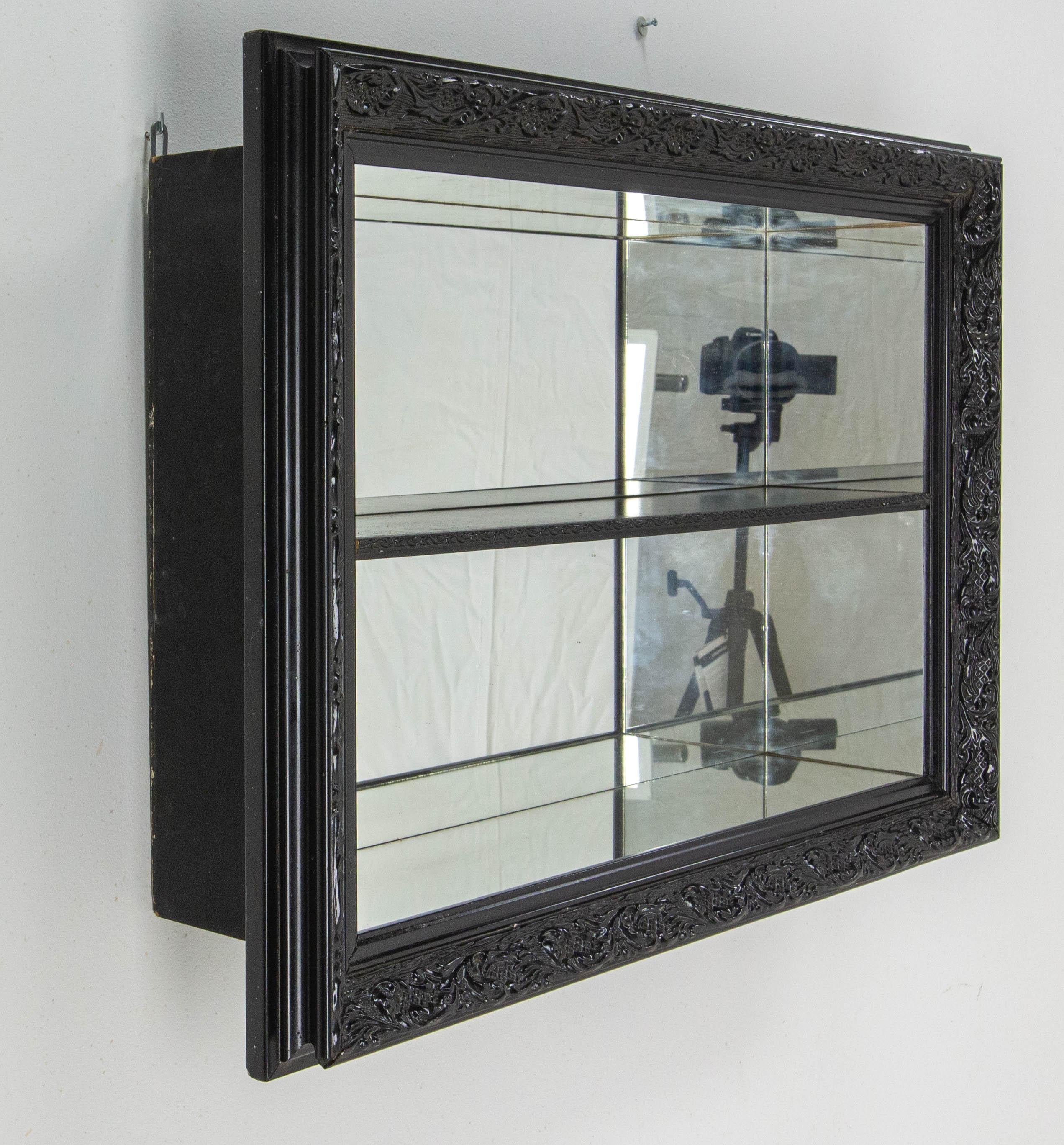 Vitrine Mirrored shelves, French, 
This item was made circa 1960 with a stucco frame in the Louis XV style made circa 1900
Wood shelf
Unsual and very decorative
Dimensions inside: D 4.53 in. W 22.64 in. P 11.5 H 7.09 in. x2 (P 11.5 cm L 57.5 cm