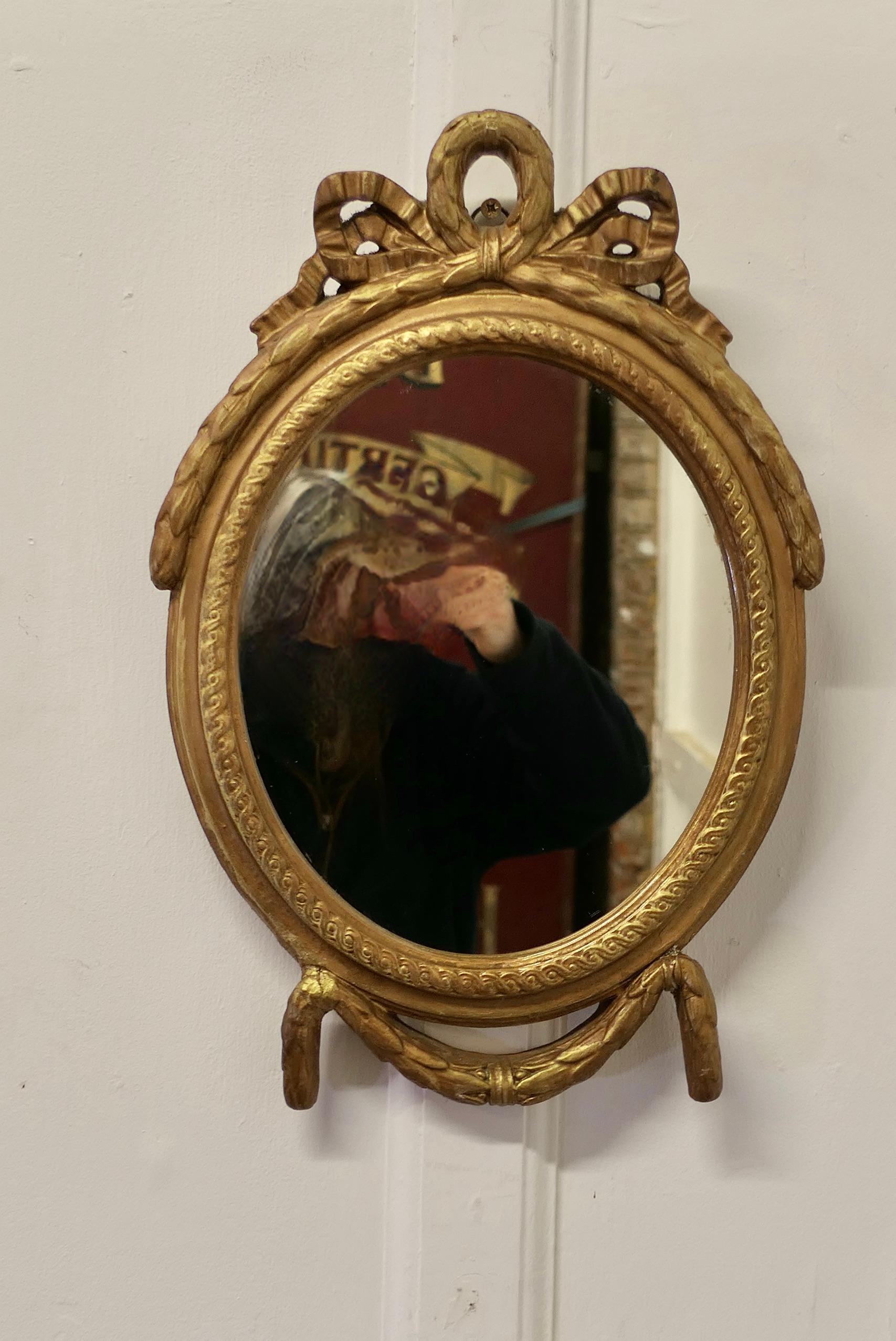 Adam Style Decorative Gilt Oval Mirror    For Sale