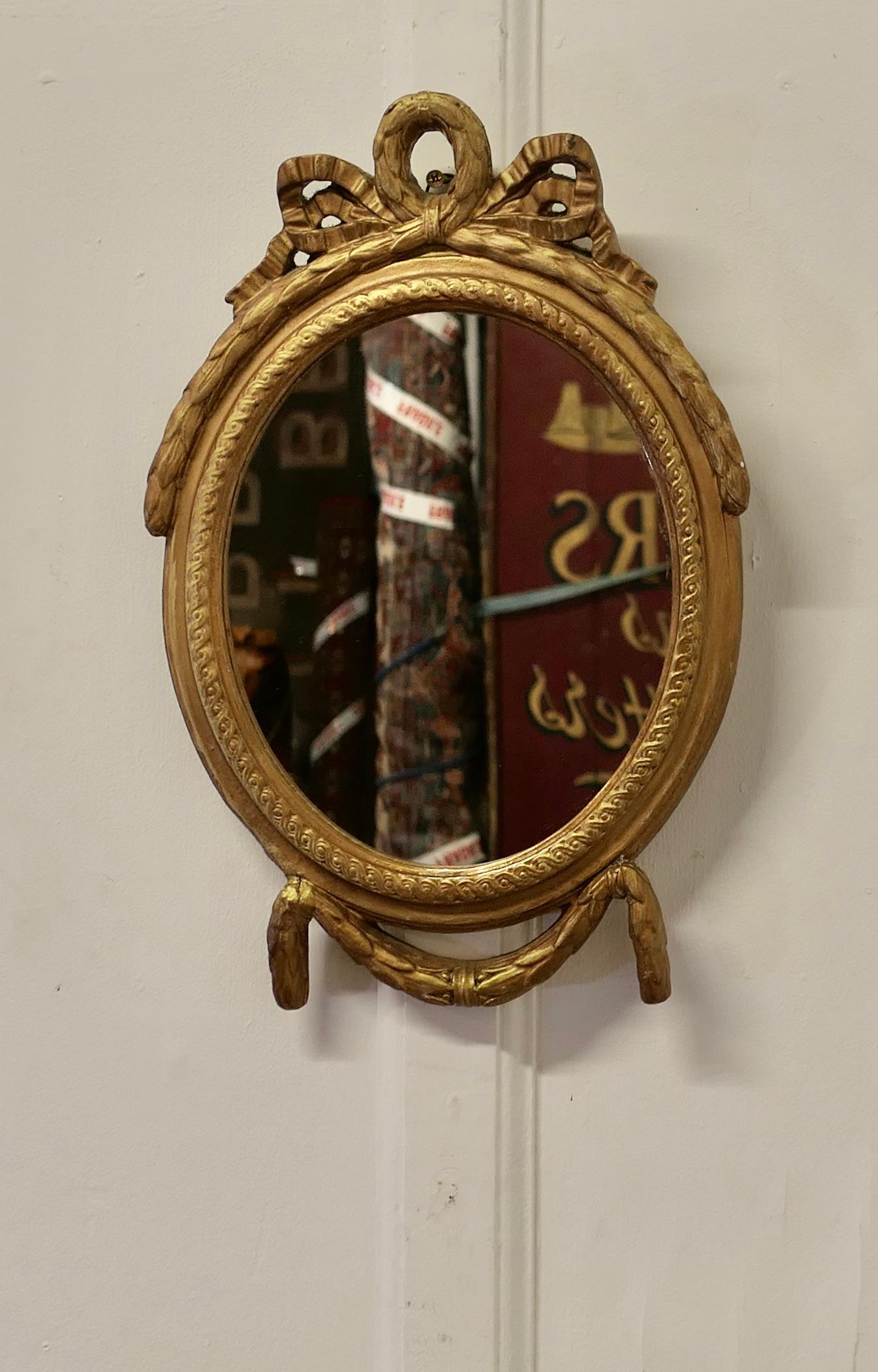 Giltwood Decorative Gilt Oval Mirror    For Sale