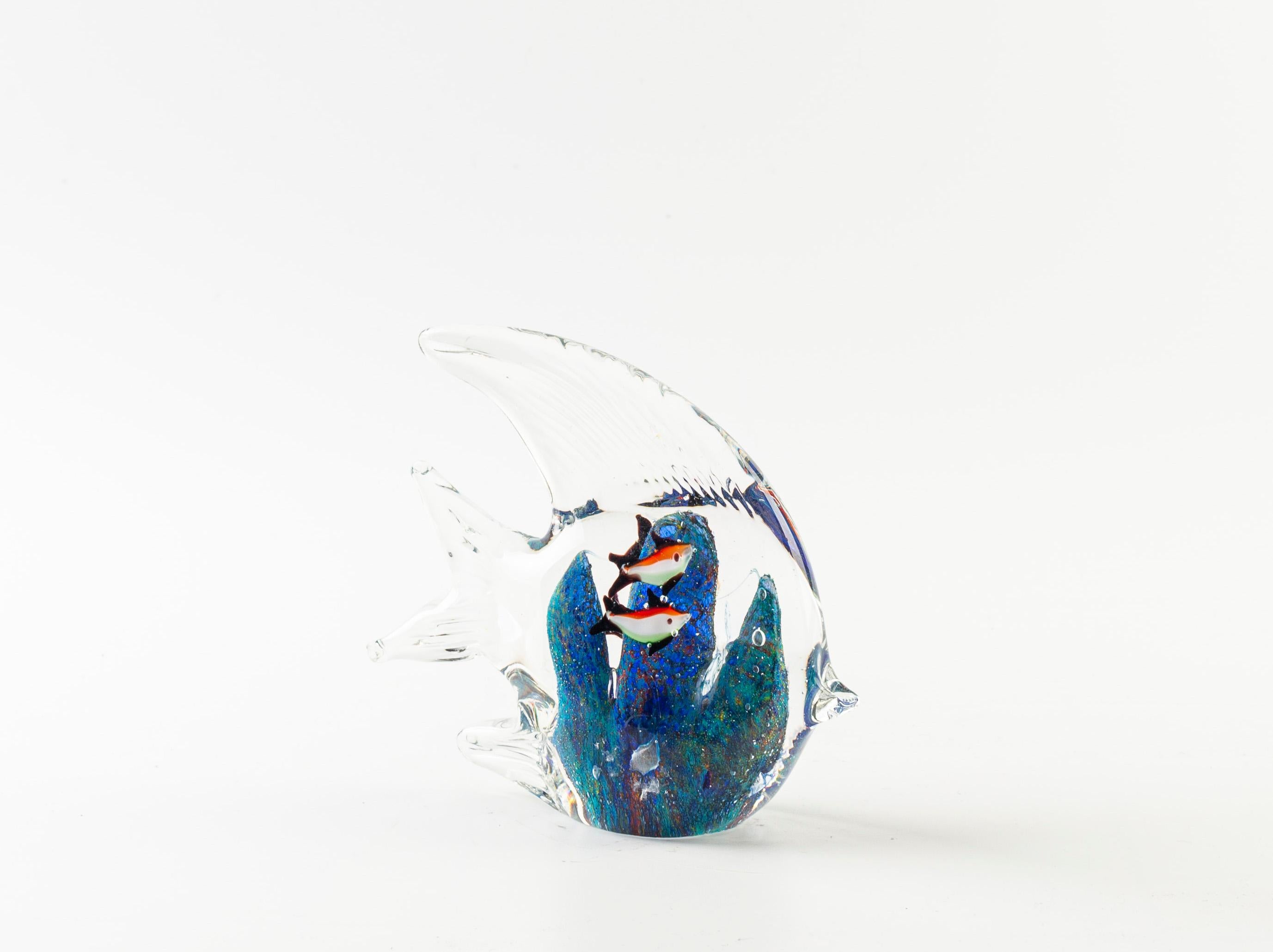 This Decorative glass fish realized by a Northern Europe manufacture during the 1970s.

The objects is preserved in excellent conditions, designed in a fish shape with two coloured glass fishes 