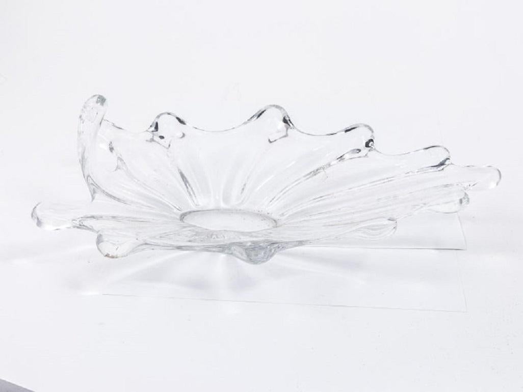 Decorative glass dish in the shape of a large leaf, circa 1900.