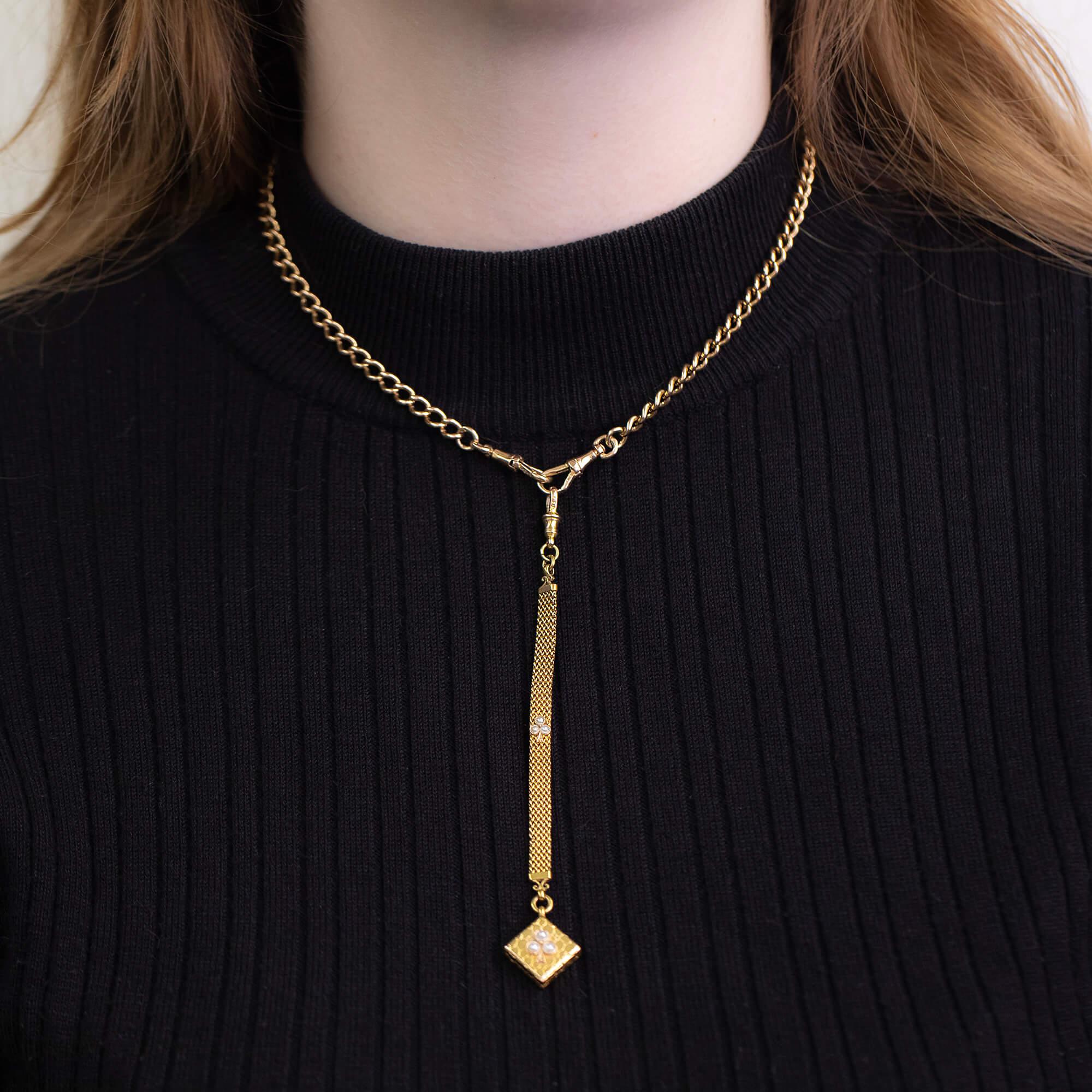 Edwardian Decorative Gold Fob with Pearl Set Charm Circa 1900 For Sale