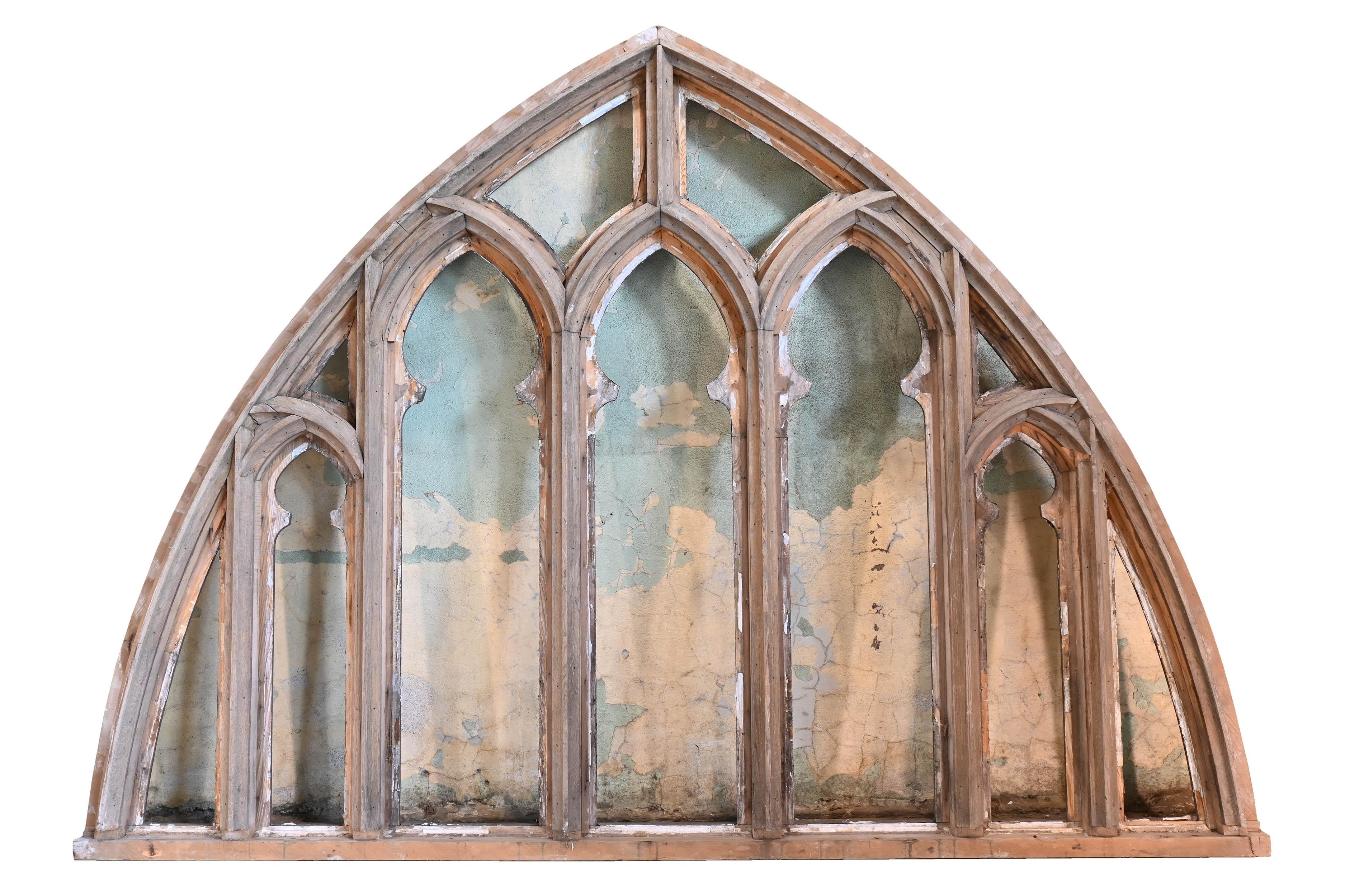 Matching pieces from this deconstruction! Soon we will be adding a quantity of large tracery bell tower covers in quantity. Stay tuned!

Salvaged from circa 1890s
Condition: Age consistent tracery with out glass
Material: Oak and fir
Finish:
