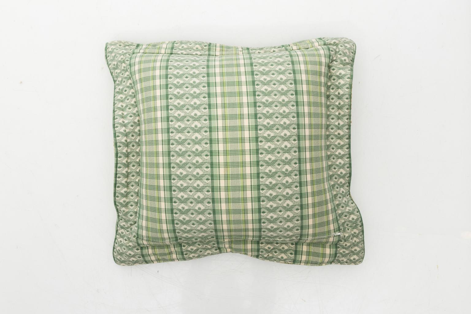 Pair of decorative green and white Cowtan & Tout pillows.
 