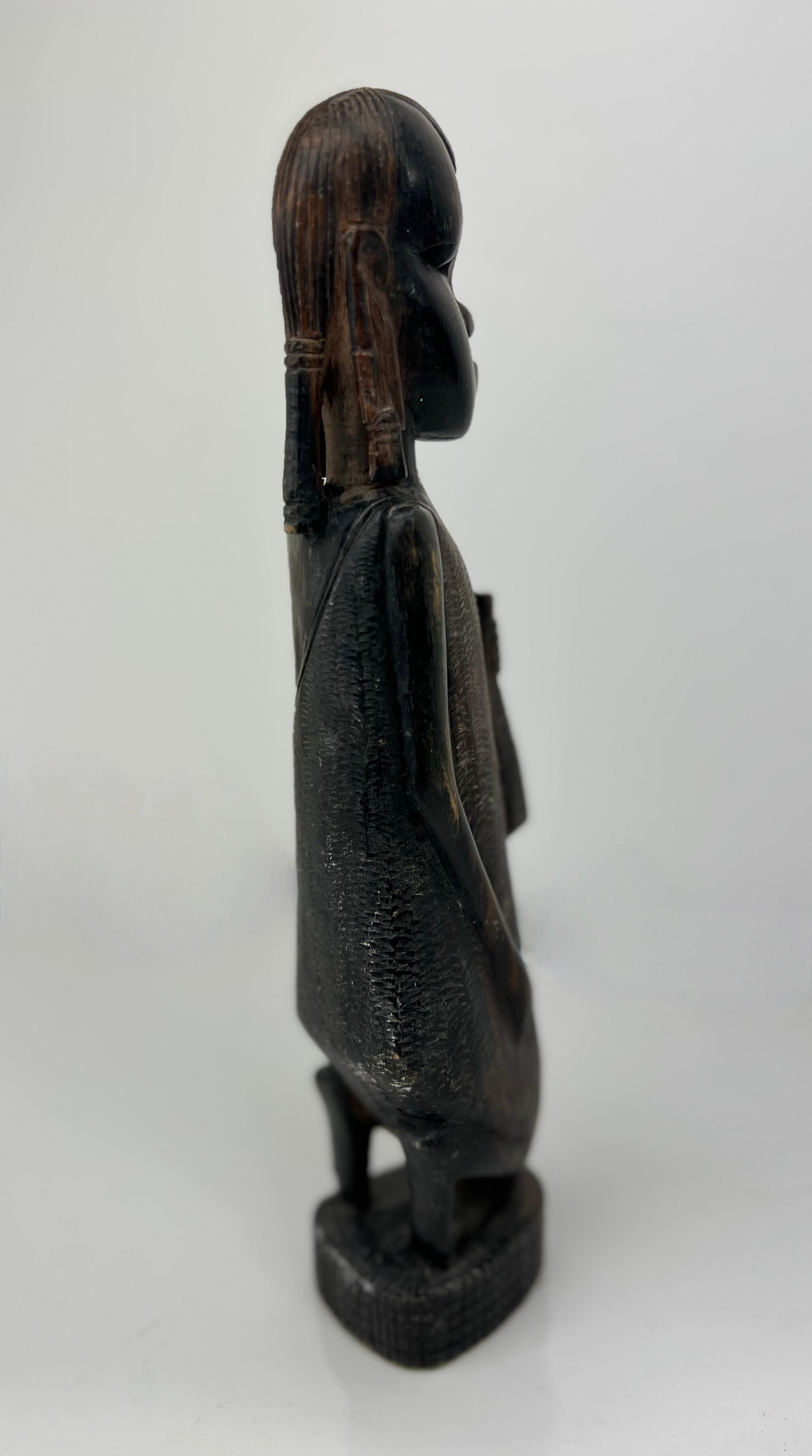 Kenyan Decorative Hand-Carved African Sculpture of Kneeling Tribal Man Dark Wood  For Sale