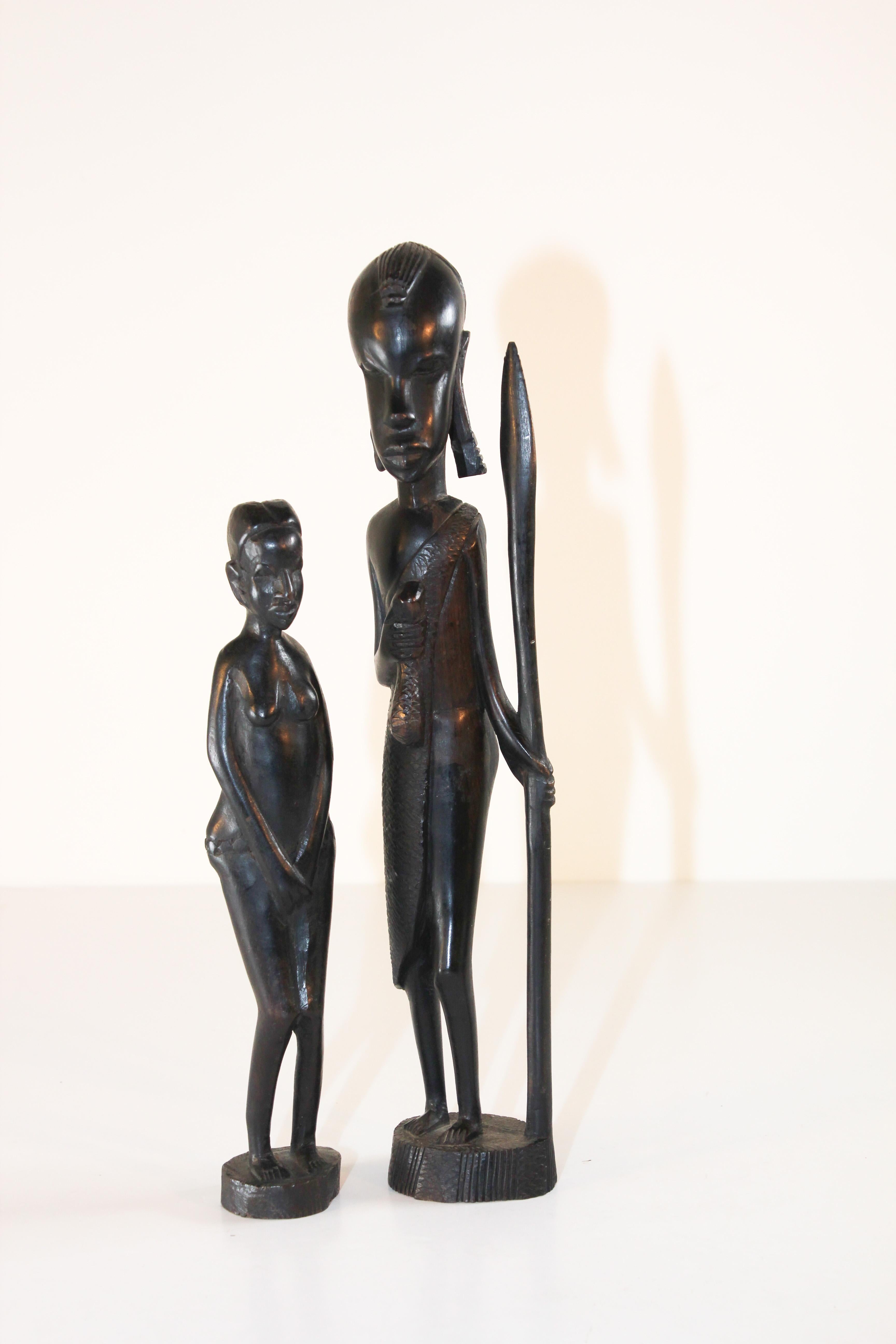 Decorative ebony well hand-carved African statues of two women.
Handmade in Kenya, Africa
Measures: 
1 - 14