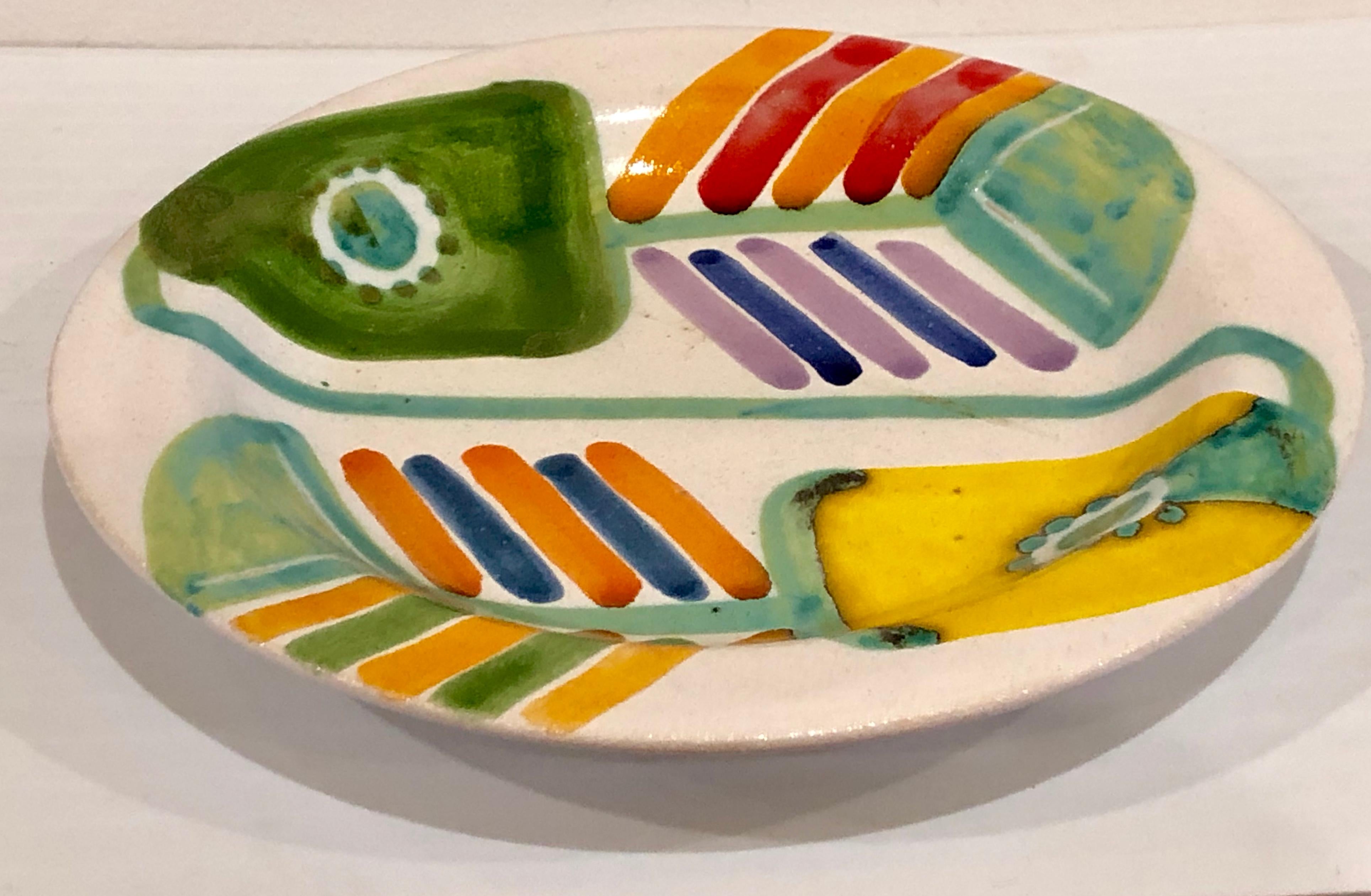 Beautiful design on this ceramic plate, highly collectible plate by DeSimone, circa 1960s, made in Italy, great condition no chips or cracks very light wear. Signed and numbered.
